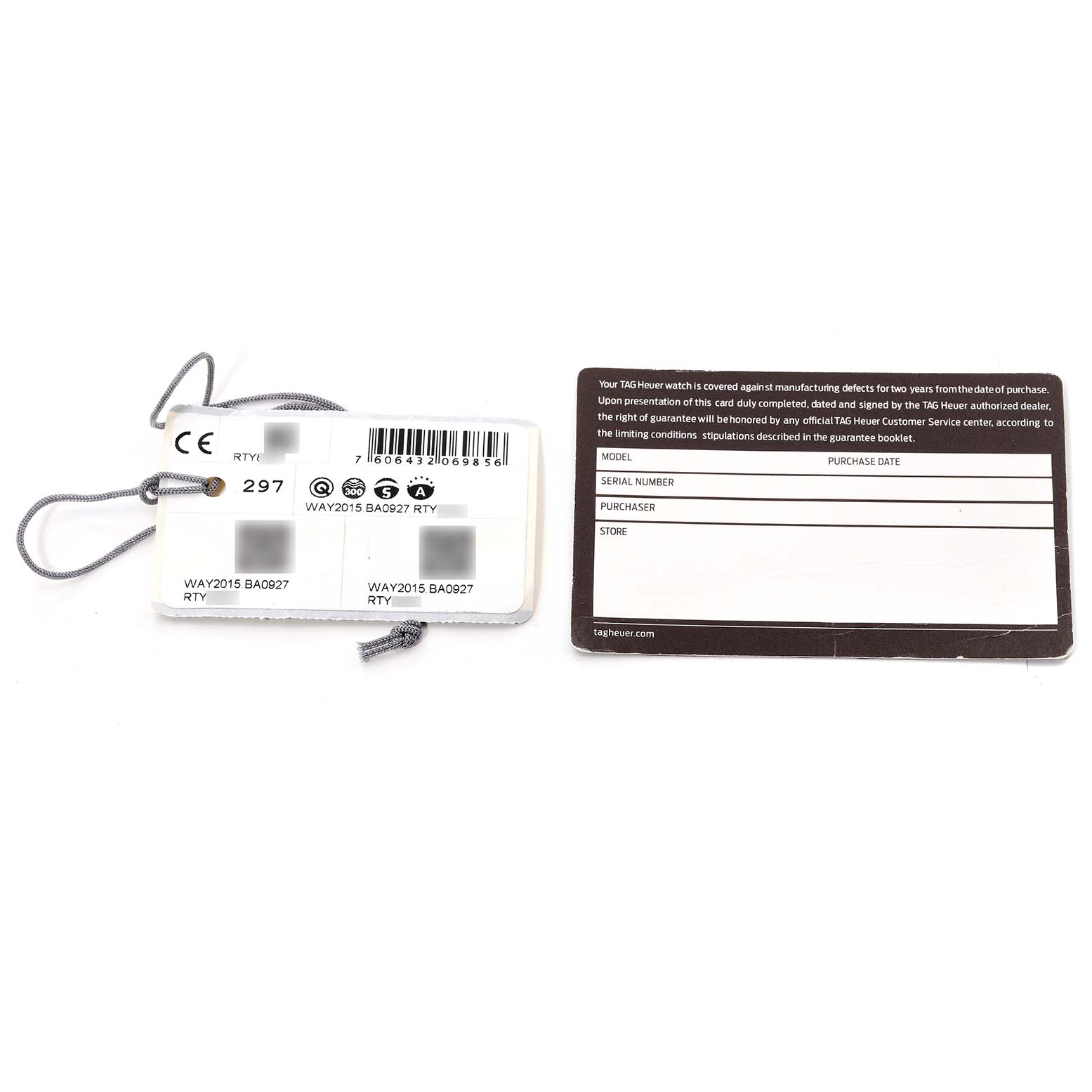 The image shows a warranty card and a tag for the Tag Heuer Aquaracer WAY2015.BA0927 Men's Stainless Steel Green Dial WAY2015.BA0927 Men's Stainless Steel Green Dial model WAY2015.BA0927.