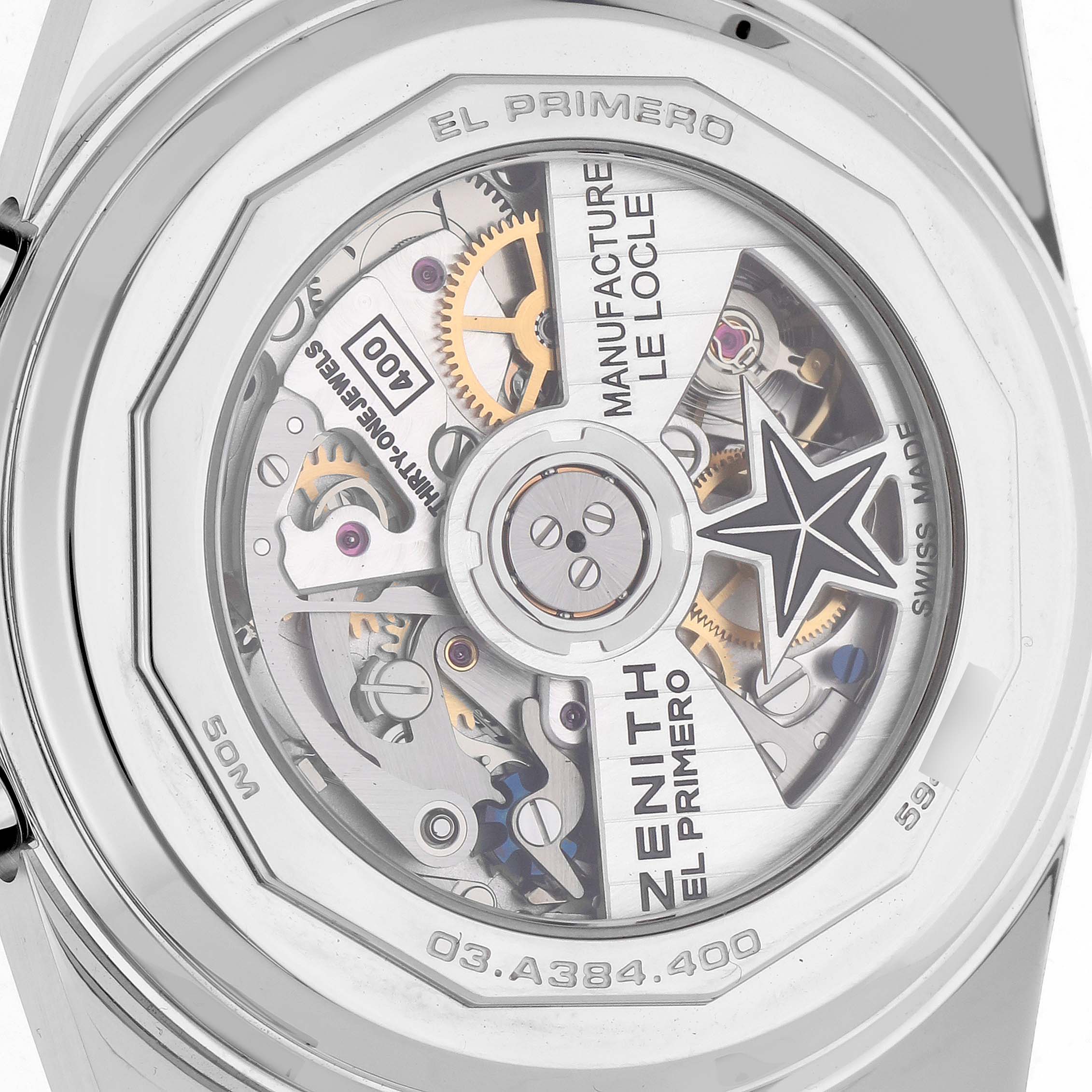 The image shows the case back of the Zenith Chronomaster model 03.A384.400/385.M385, revealing its intricate movement and gears from a directly top-down angle.