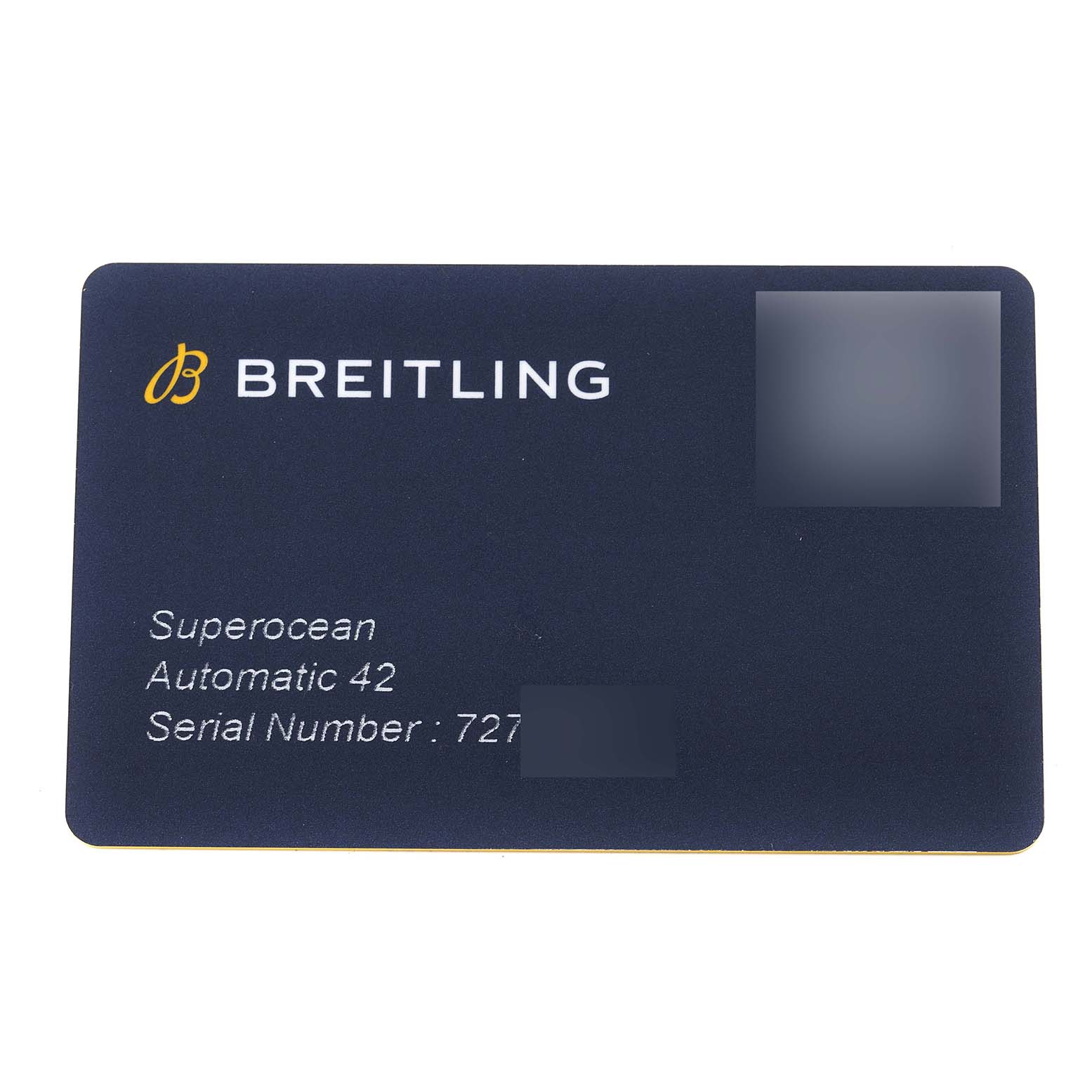 This image shows a close-up of a Breitling Superocean A17366 Men's Stainless Steel White Dial A17366 Men's Stainless Steel White Dial warranty card, detailing the model, automatic movement, and serial number.