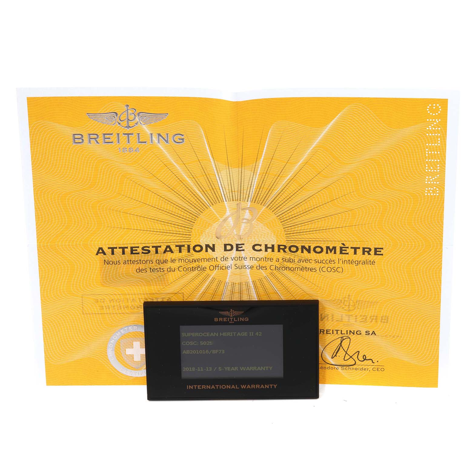 The image shows the certification and warranty card for a Breitling Superocean AB2010 Men's Stainless Steel Black Dial AB2010 Men's Stainless Steel Black Dial watch.