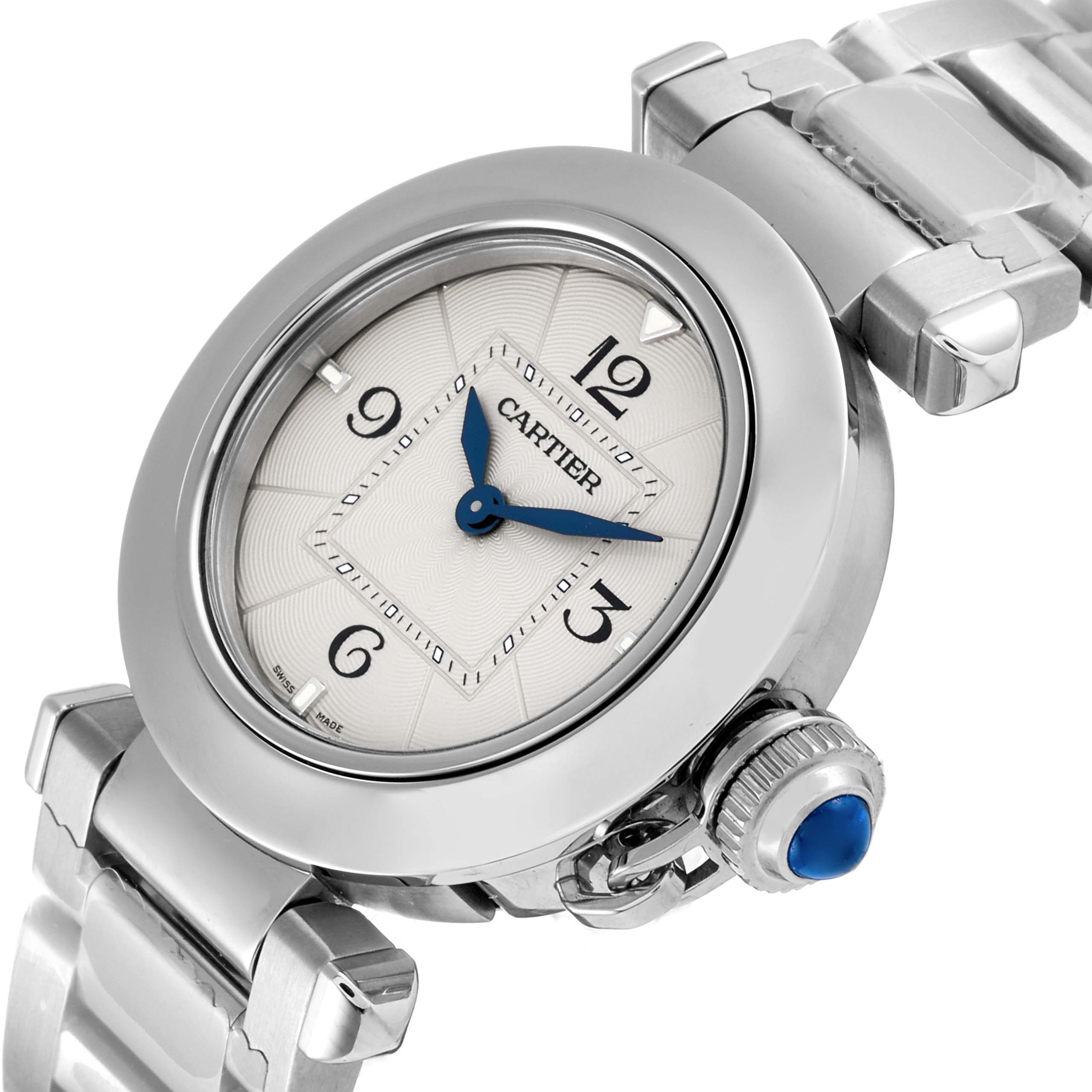 The image shows a Cartier Pasha WSPA0021 Women
s Stainless Steel Silver Dial WSPA0021 Women
s Stainless Steel Silver Dial watch at an angle highlighting the dial, bezel, crown, and part of the bracelet.
