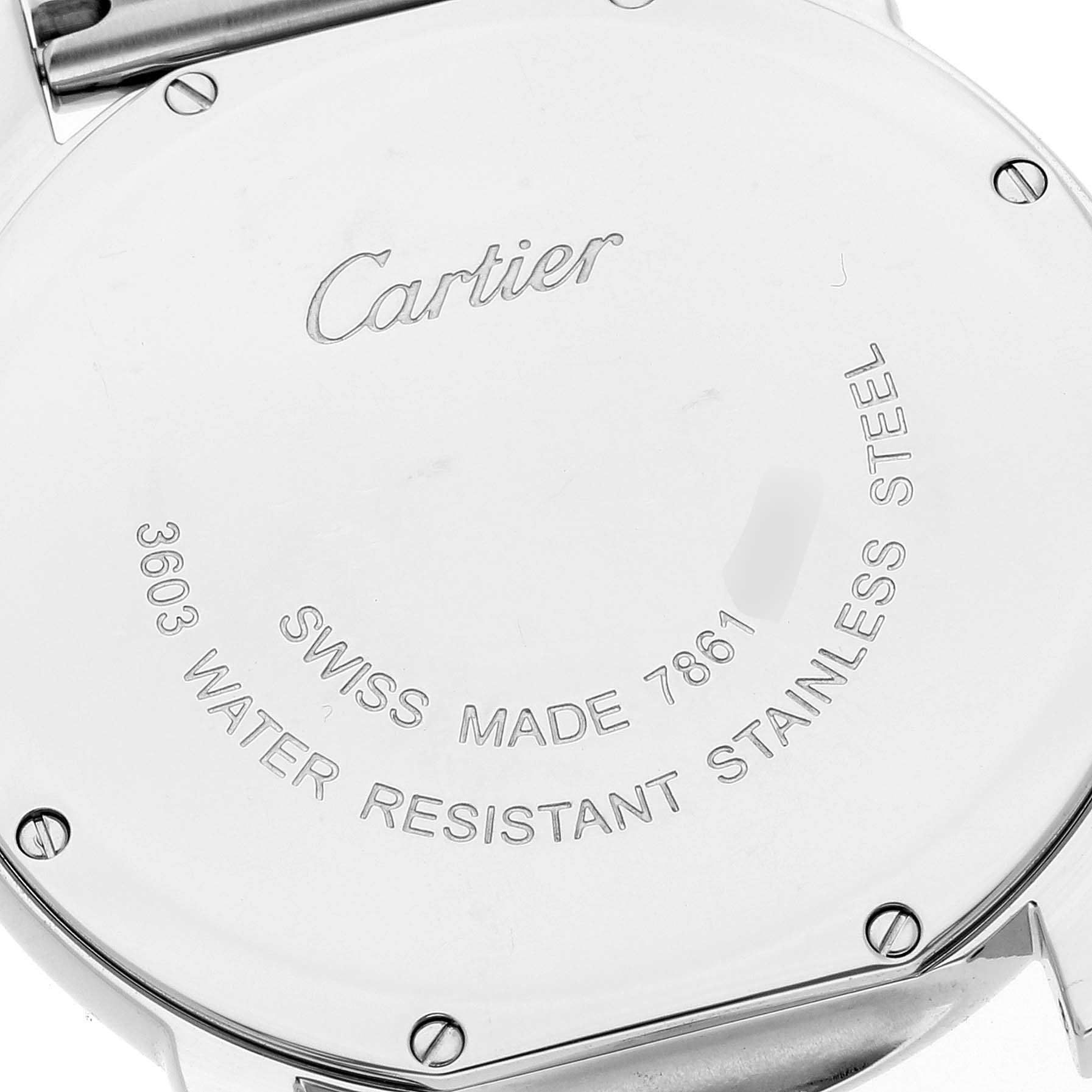 The image shows the back case of the Cartier Ronde W6701005 Men
s Stainless Steel Silver Dial W6701005 Men
s Stainless Steel Silver Dial watch, highlighting engravings and screw details.
