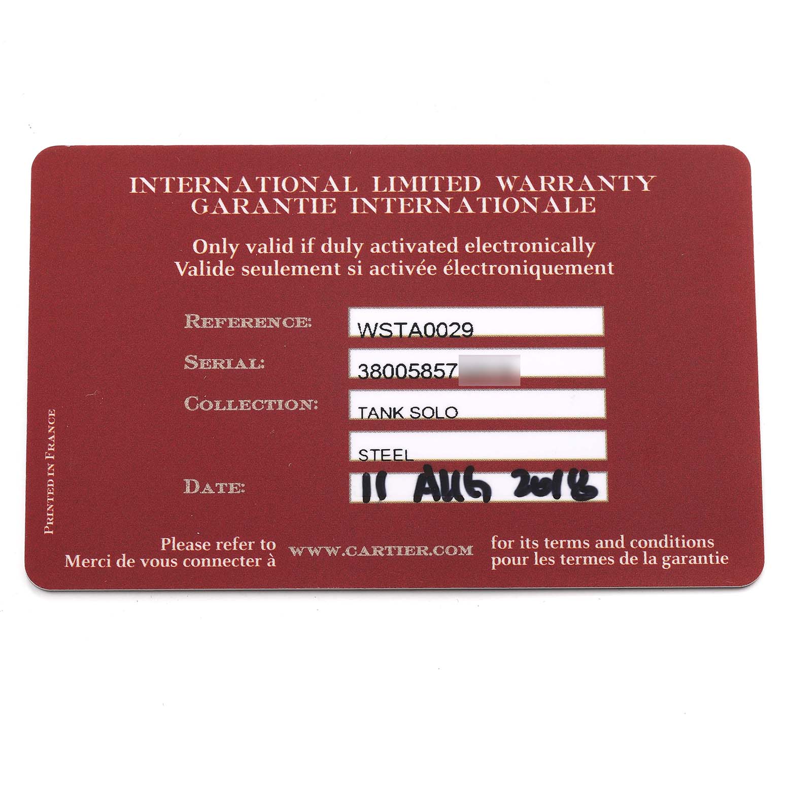 This image shows the International Limited Warranty card for the Cartier Tank Solo WSTA0029 Men
s Stainless Steel Silver Dial WSTA0029 Men
s Stainless Steel Silver Dial model watch.