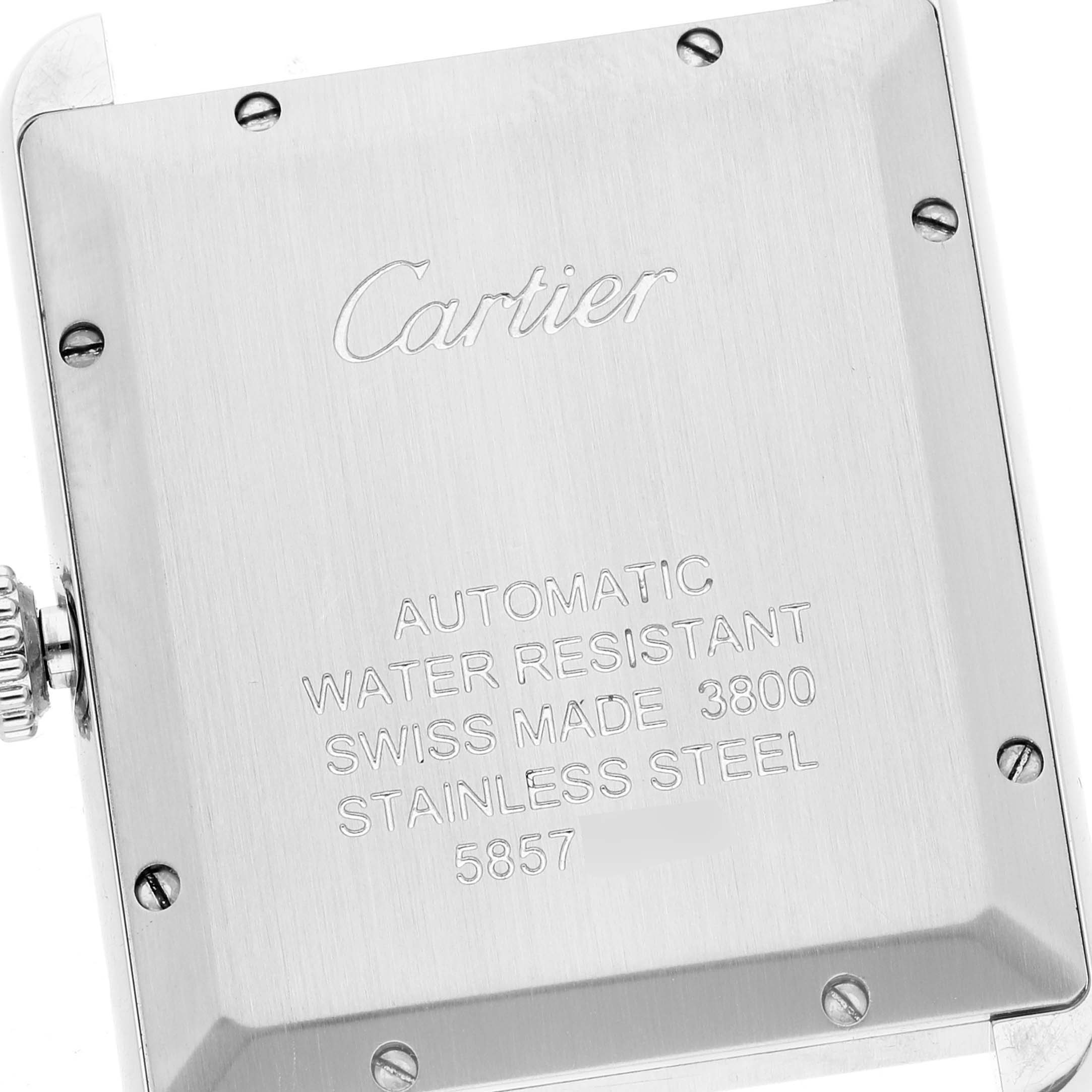 The image shows the back case of a Cartier Tank Solo WSTA0029 Men
s Stainless Steel Silver Dial WSTA0029 Men
s Stainless Steel Silver Dial watch, detailing its specifications and brand engraving.