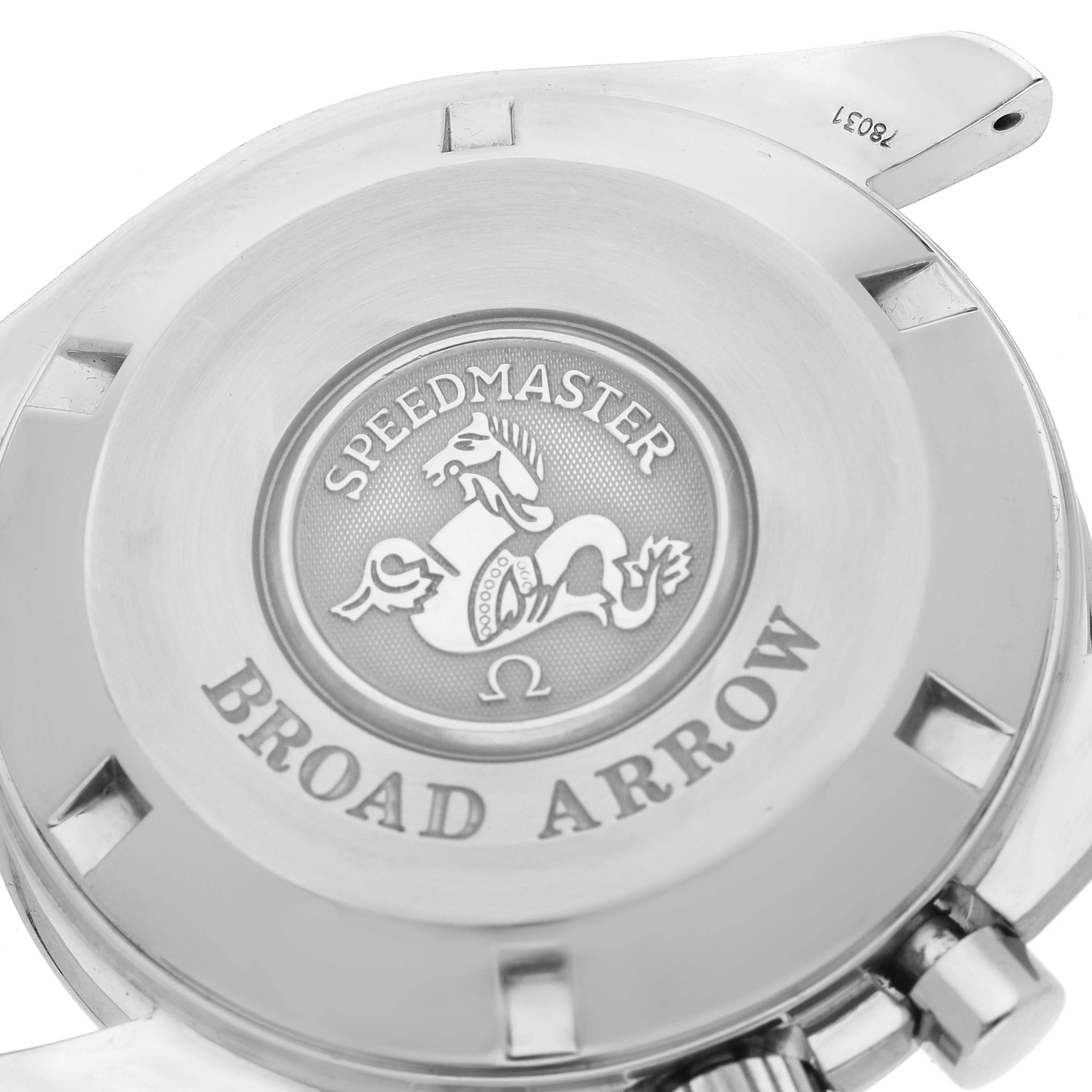 The image shows the back case of the Omega Speedmaster 3551.20.00 Men
s Stainless Steel Beige Dial 3551.20.00 Men
s Stainless Steel Beige Dial Broad Arrow watch, highlighting its engraved emblem and text.