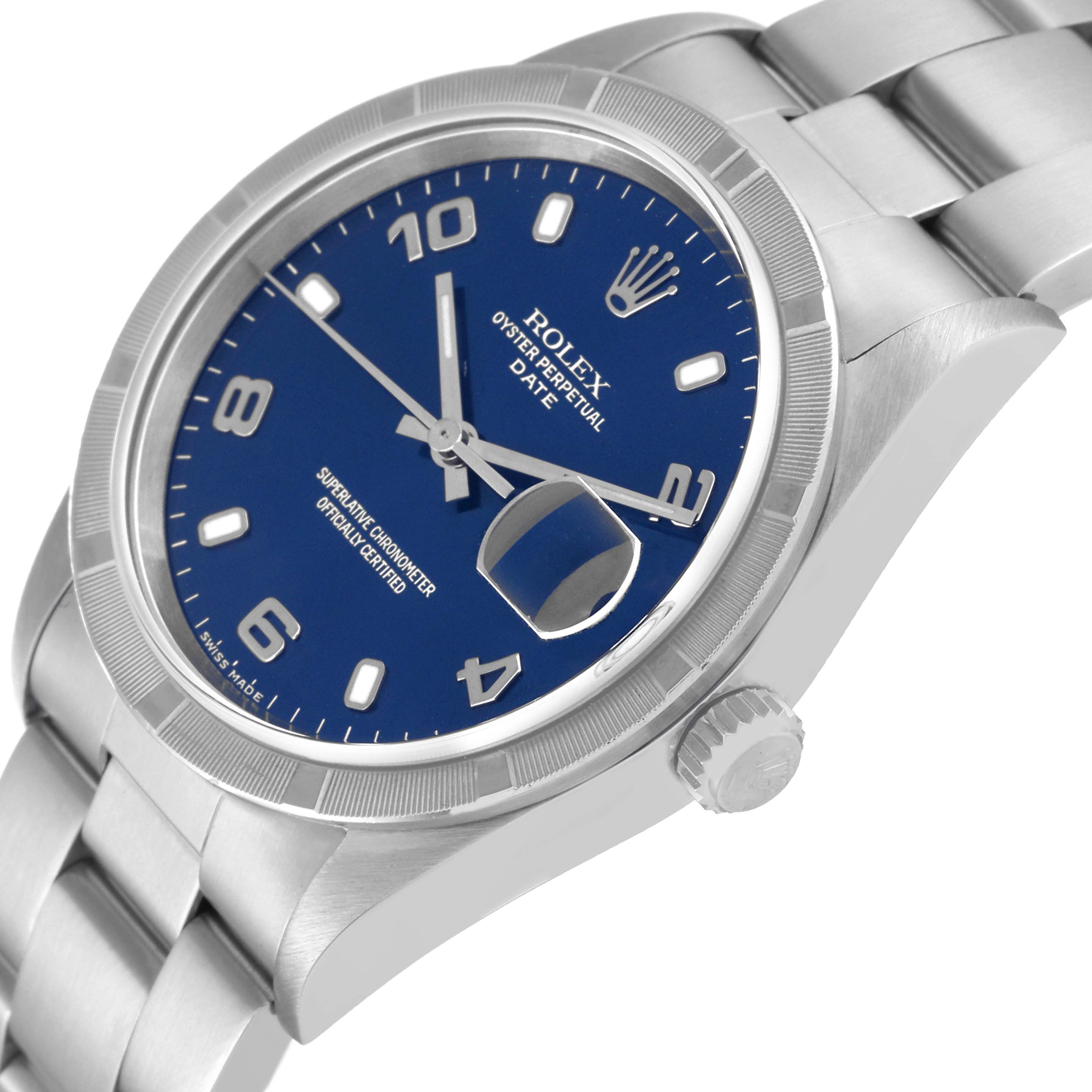 This Rolex Oyster Perpetual Date watch is shown at a three-quarter angle, highlighting the blue dial, date magnifier, and bracelet.