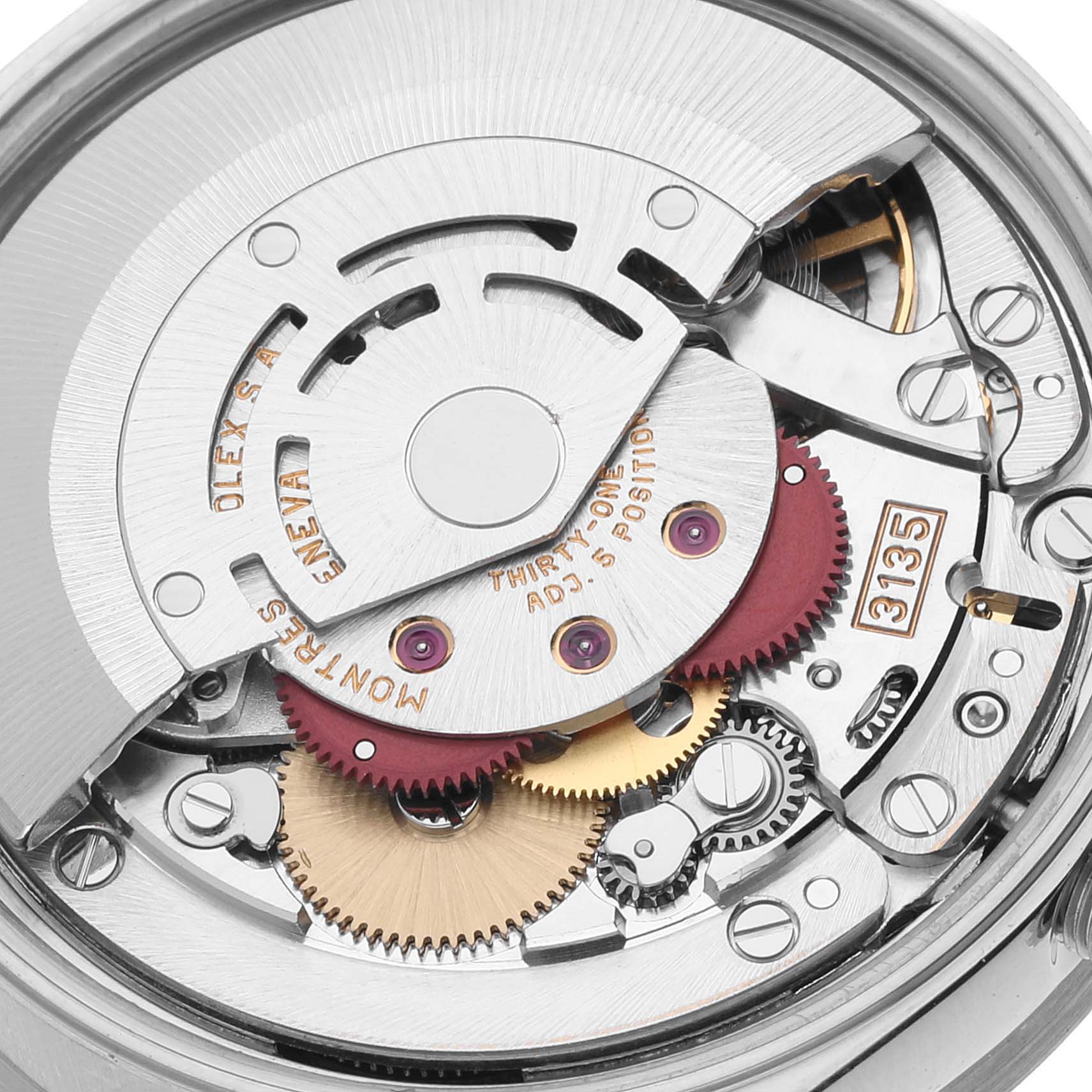 This image shows a close-up view of the inner mechanical movement of a Rolex Date 15210 Men's Stainless Steel Blue Dial 15210 Men's Stainless Steel Blue Dial model watch.