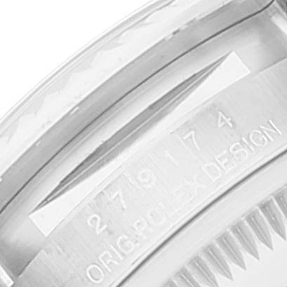 The image shows a close-up of the side and part of the bezel of a Rolex Datejust 279174 Women's Stainless Steel Pink Dial 279174 Women's Stainless Steel Pink Dial watch, highlighting the model number and "ORIG. ROLEX DESIGN" engraving.