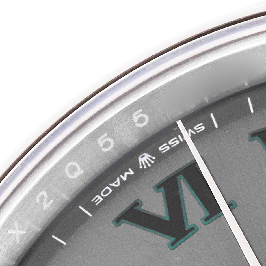 The image shows a close-up of the Rolex Datejust 41 126300 Men's Stainless Steel Grey Dial 126300 Men's Stainless Steel Grey Dial model, focusing on the dial's edge, Swiss Made inscription, and minute markers.