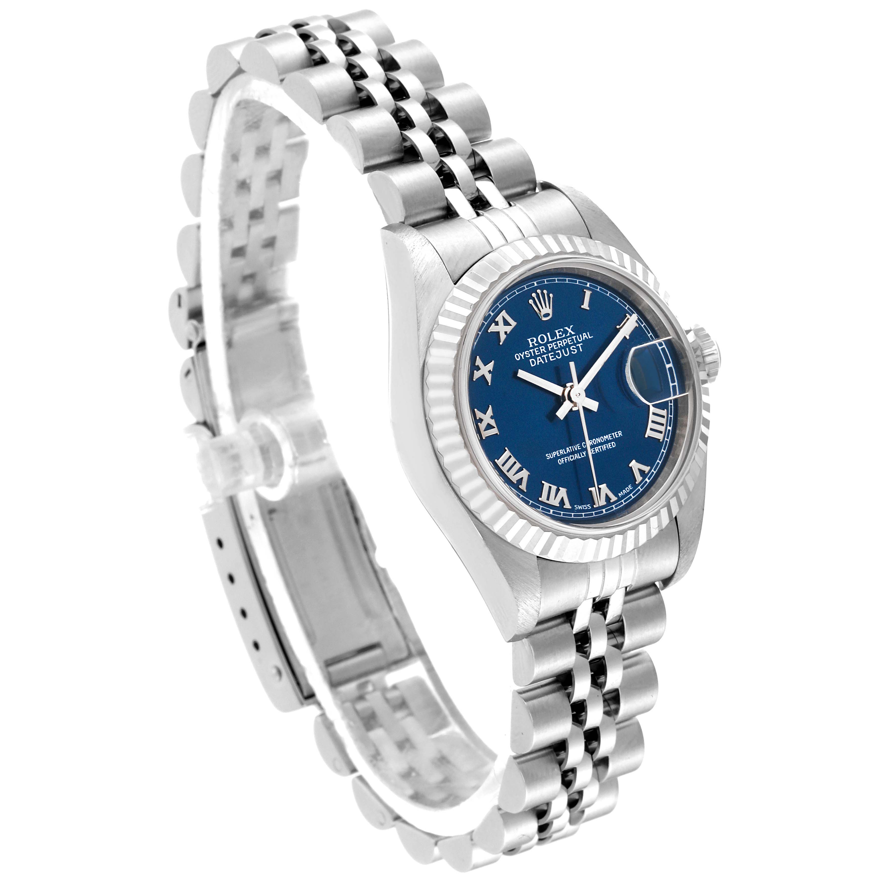 The Rolex Datejust 79174 Women
s Stainless Steel Blue Dial 79174 Women
s Stainless Steel Blue Dial watch is shown at a three-quarter angle, highlighting the blue dial, bezel, and the jubilee bracelet.