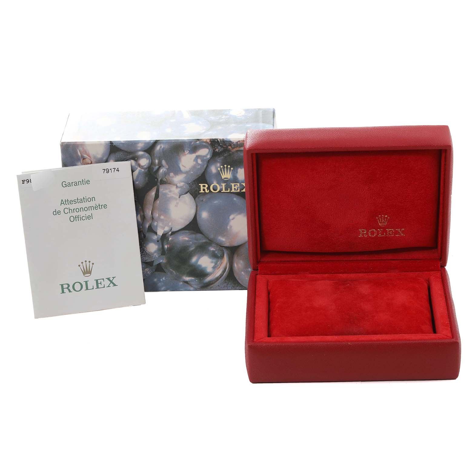 The image shows a Rolex Datejust 79174 Women's Stainless Steel Mother of Pearl Dial 79174 Women's Stainless Steel Mother of Pearl Dial's red watch box, outer packaging, and warranty card.