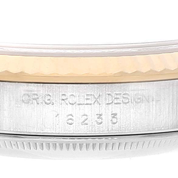 This image shows a close-up side view of the bezel and case side of a Rolex Datejust 16233 Men
s Steel and Gold (two tone) Black Dial 16233 Men
s Steel and Gold (two tone) Black Dial model, displaying the engraving "ORIG. ROLEX DESIGN 16233."