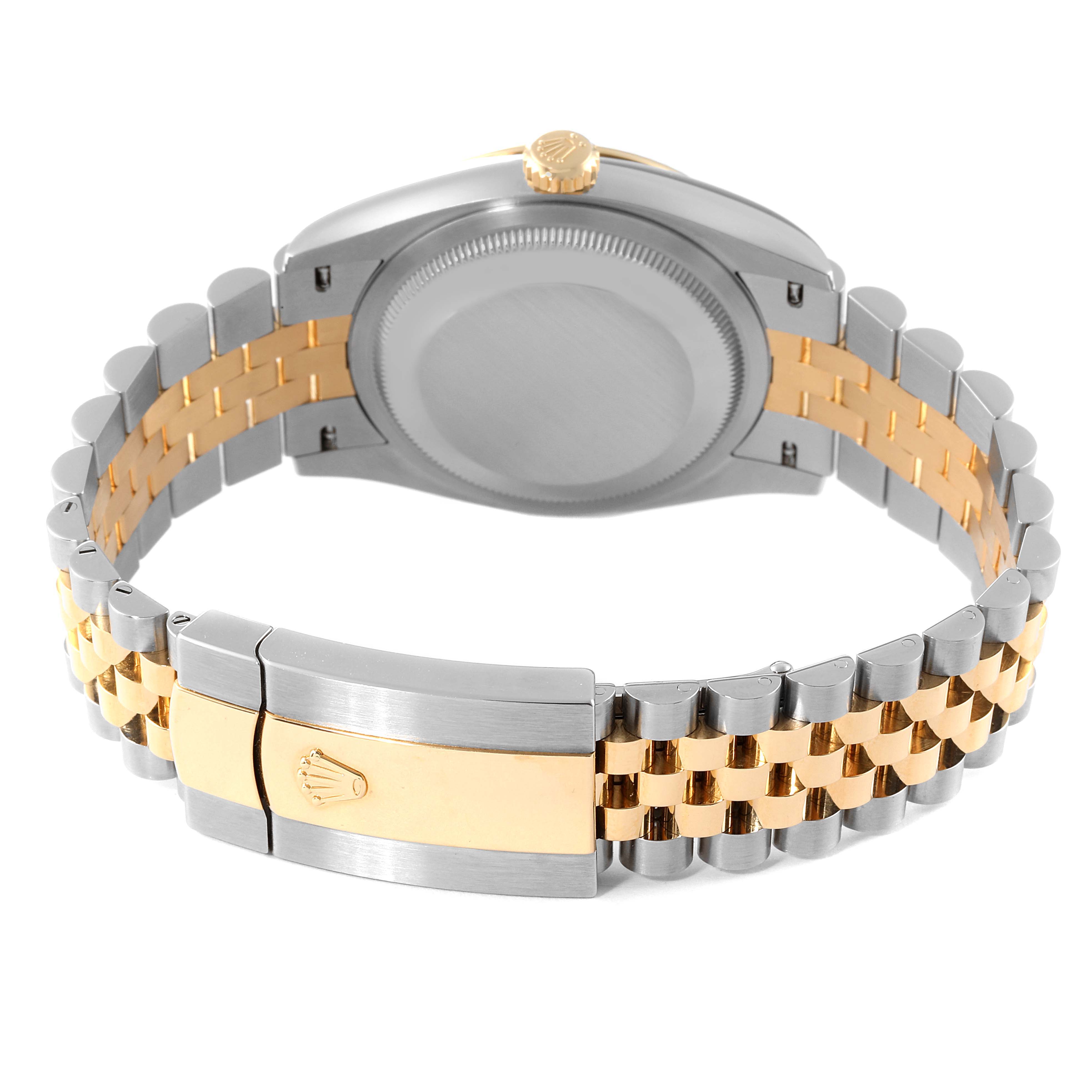 This image shows the back of a Rolex Datejust 126233 Men's Steel and Gold (two tone) Champagne Dial 126233 Men's Steel and Gold (two tone) Champagne Dial watch, highlighting its case back and two-tone metal bracelet with the clasp.