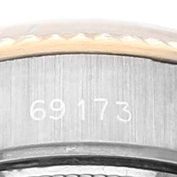 This image shows the case side of a Rolex Datejust 69173 Women's Steel and Gold (two tone) White Dial 69173 Women's Steel and Gold (two tone) White Dial watch with the model number 69173 engraved.