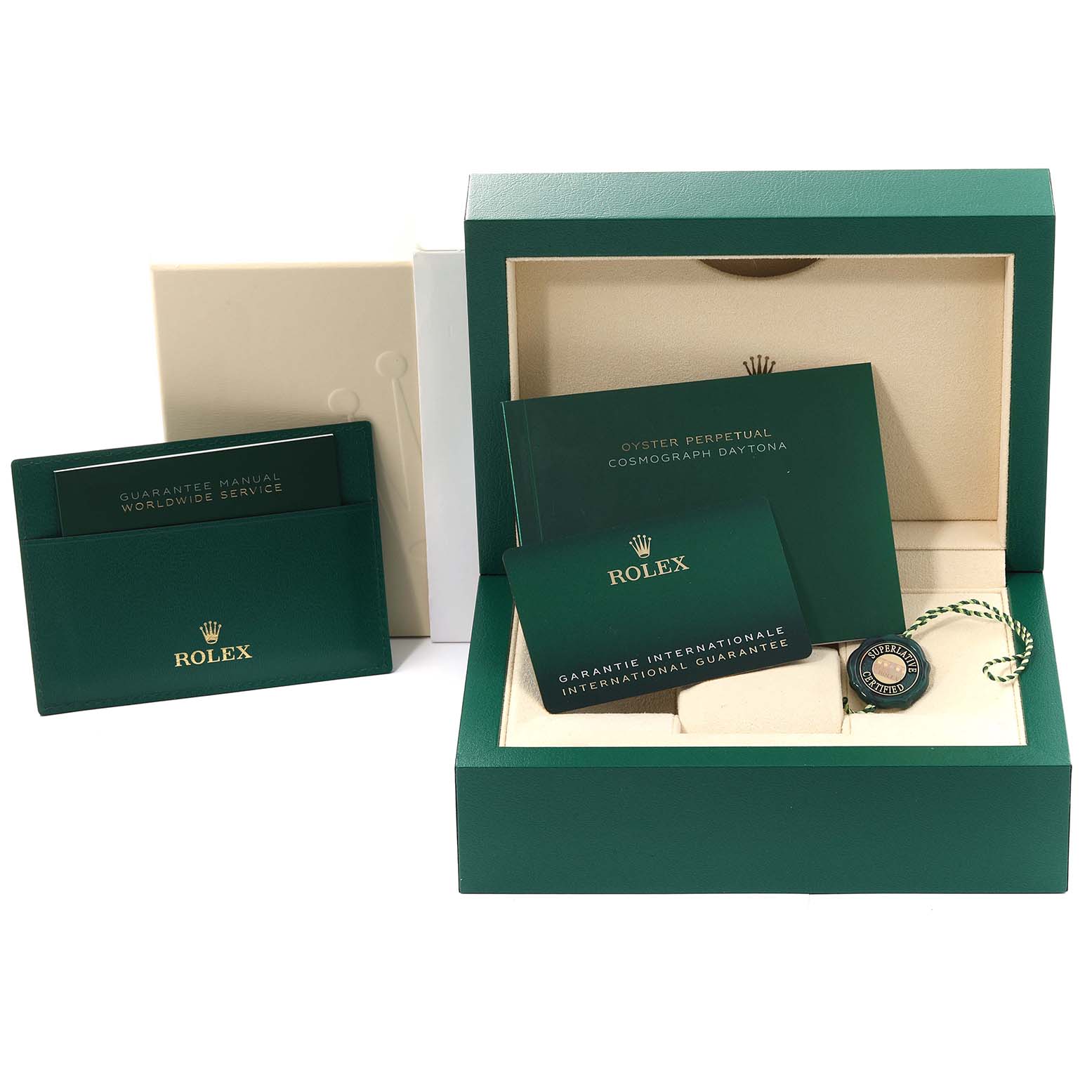 This image shows the packaging, warranty cards, booklets, and tags for a Rolex Daytona 126500 Men's Stainless Steel White Dial 126500 Men's Stainless Steel White Dial watch.