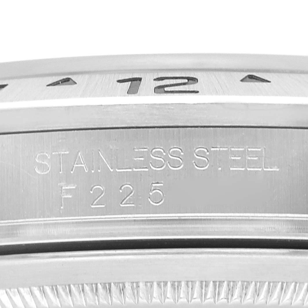 This close-up image shows the side engraving on a stainless steel Rolex Explorer 16570 Men
s Stainless Steel White Dial 16570 Men
s Stainless Steel White Dial watch case.