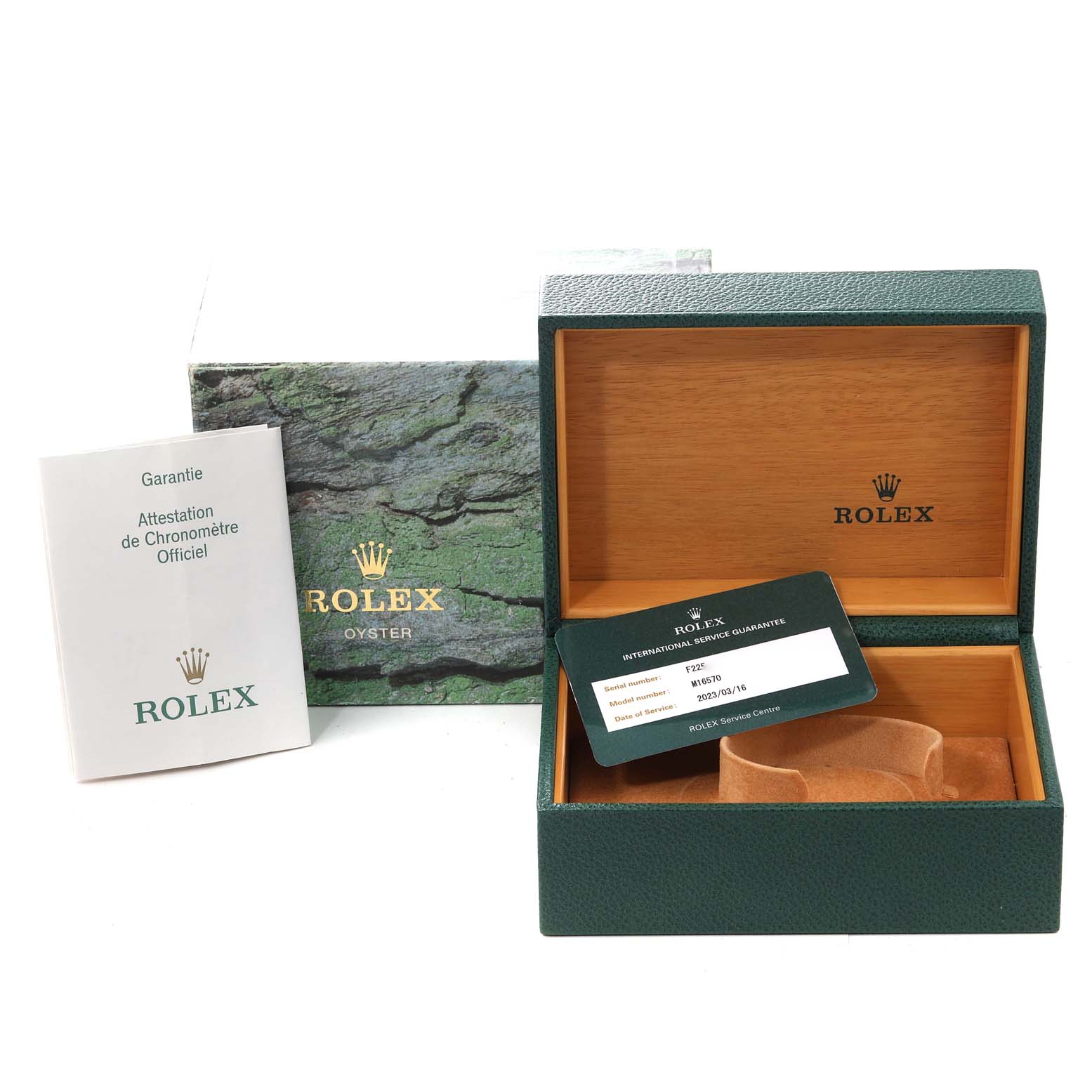 This image shows the box, warranty card, and documentation for the Rolex Explorer 16570 Men
s Stainless Steel White Dial 16570 Men
s Stainless Steel White Dial model.