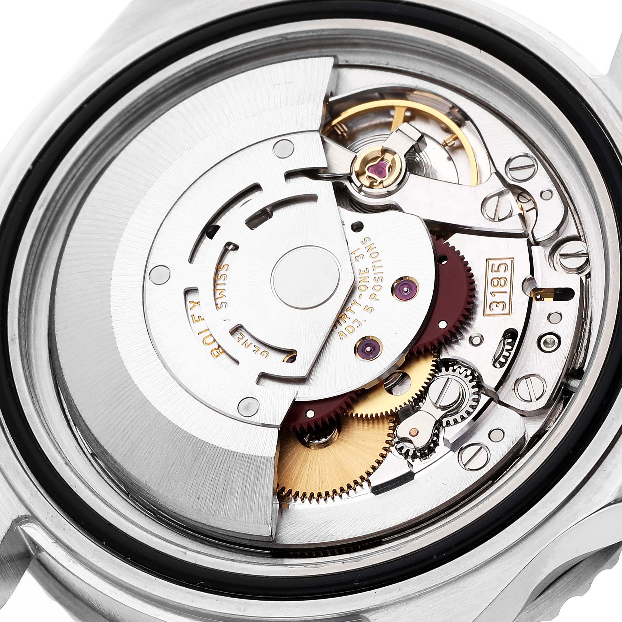The image shows an angled close-up of the movement mechanism of the Rolex GMT-Master 16710 Men
s Stainless Steel Black Dial 16710 Men
s Stainless Steel Black Dial watch.