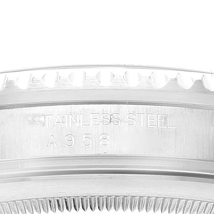 The image shows a close-up of the stainless steel case
s side and the engraved serial number of a Rolex GMT-Master 16710 Men
s Stainless Steel Black Dial 16710 Men
s Stainless Steel Black Dial watch.