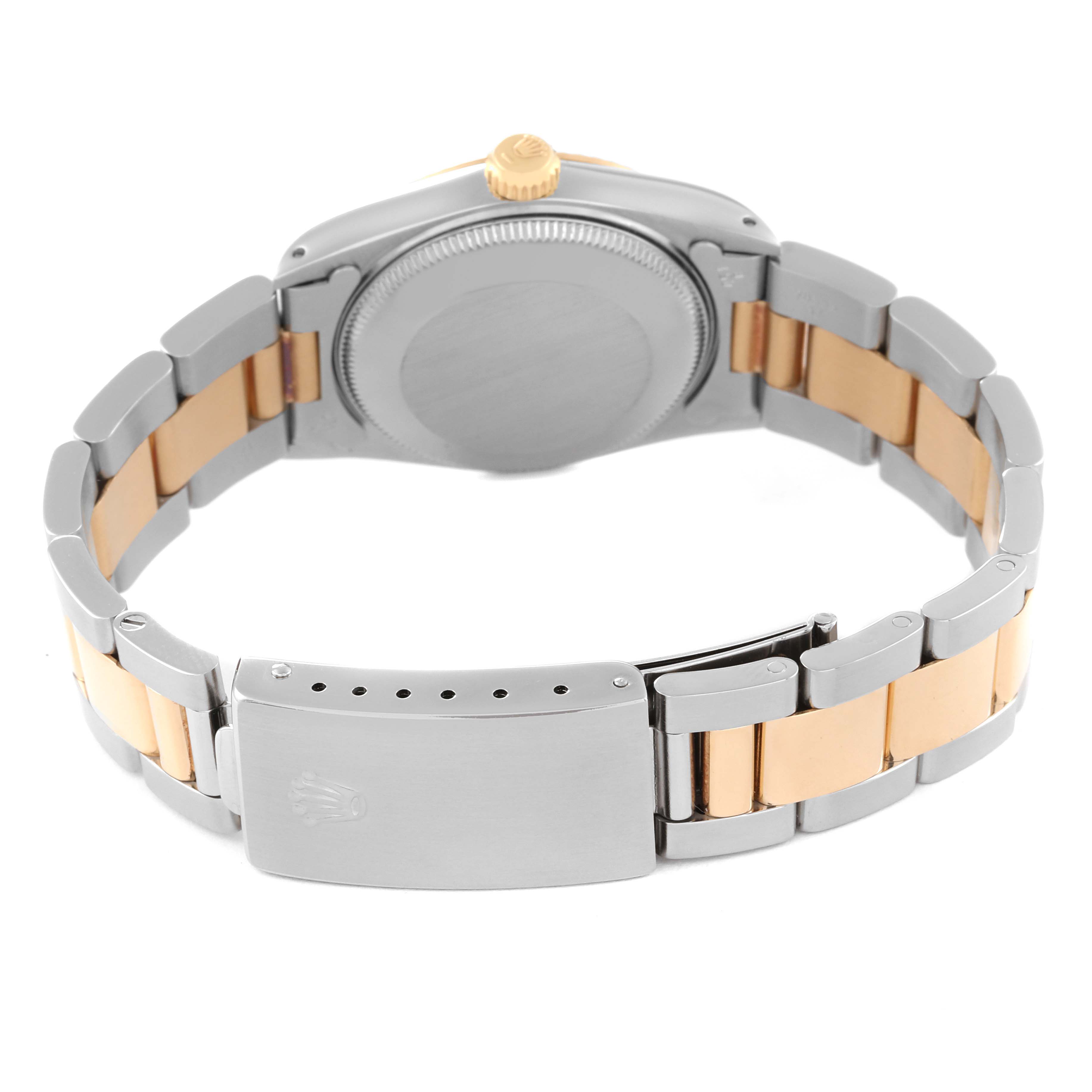 The image shows the back and clasp of a two-tone Mid-Size Rolex watch, angled slightly from the rear.