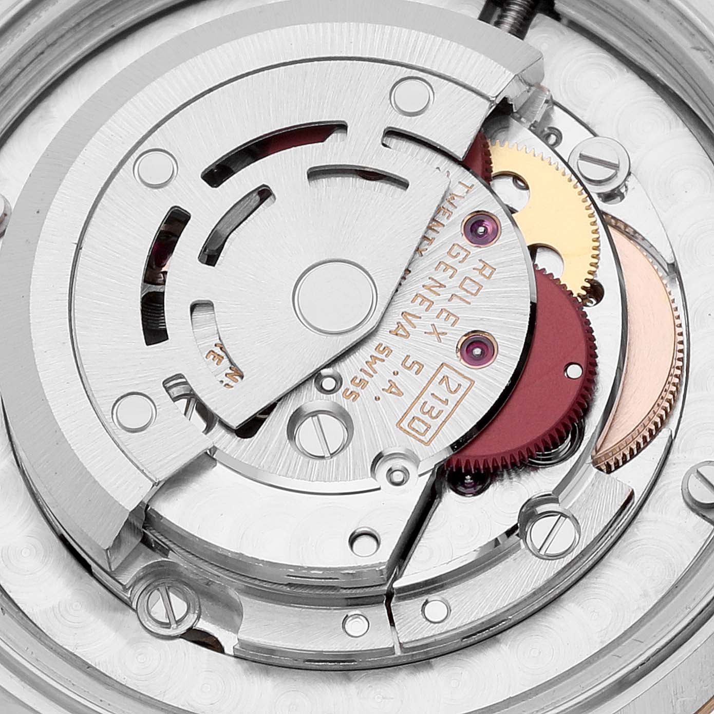 This image shows a detailed view of the mechanical movement parts in the Mid-Size Rolex watch model.