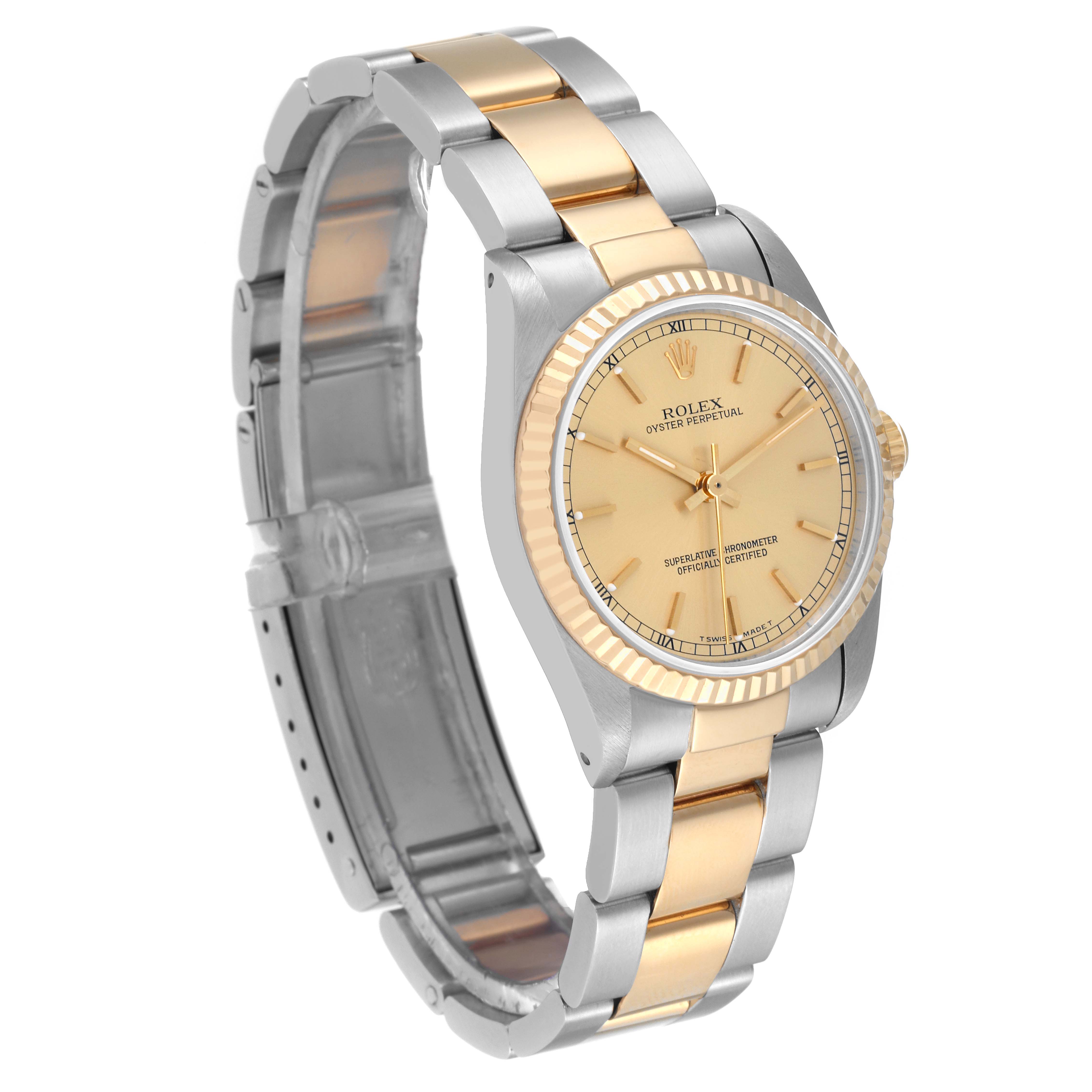This Rolex Mid-Size 67513 Women's Steel and Gold (two tone) Champagne Dial 67513 Women's Steel and Gold (two tone) Champagne Dial model is shown in a three-quarter angle, displaying the dial, bezel, and part of the bracelet.