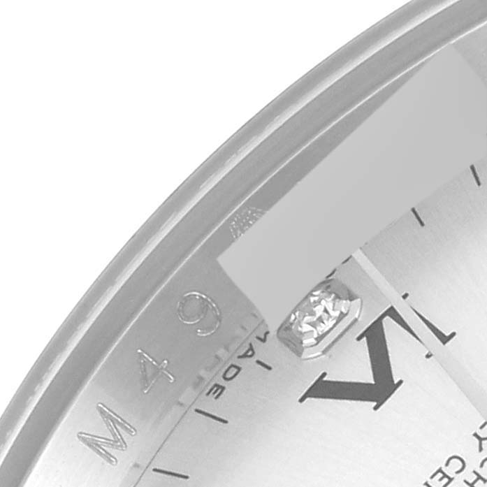 The image shows a close-up of the watch face and bezel of a Rolex Oyster Perpetual 116034 Men's Stainless Steel Silver Dial 116034 Men's Stainless Steel Silver Dial model.