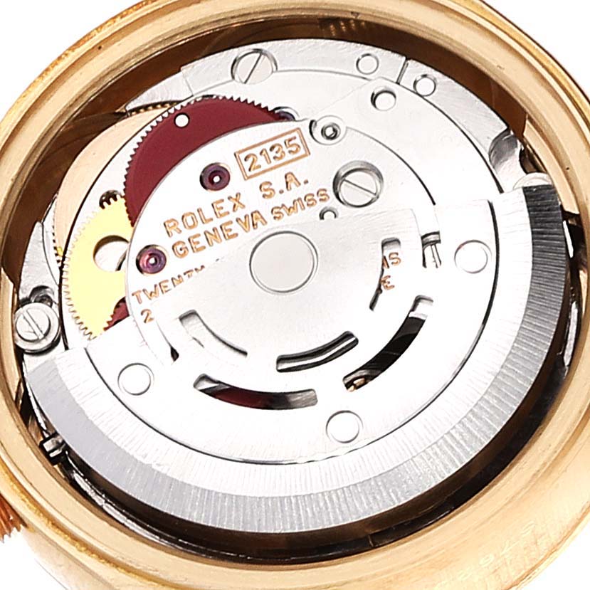 This image shows the internal movement and mechanics of a Rolex President 69178 Women
s Yellow Gold Champagne Dial 69178 Women
s Yellow Gold Champagne Dial model watch from a top-down angle.