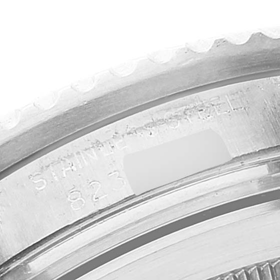 The image shows a close-up of the case back and engraved markings of a Rolex Vintage Collection 16660 Men's Stainless Steel Black Dial 16660 Men's Stainless Steel Black Dial model.