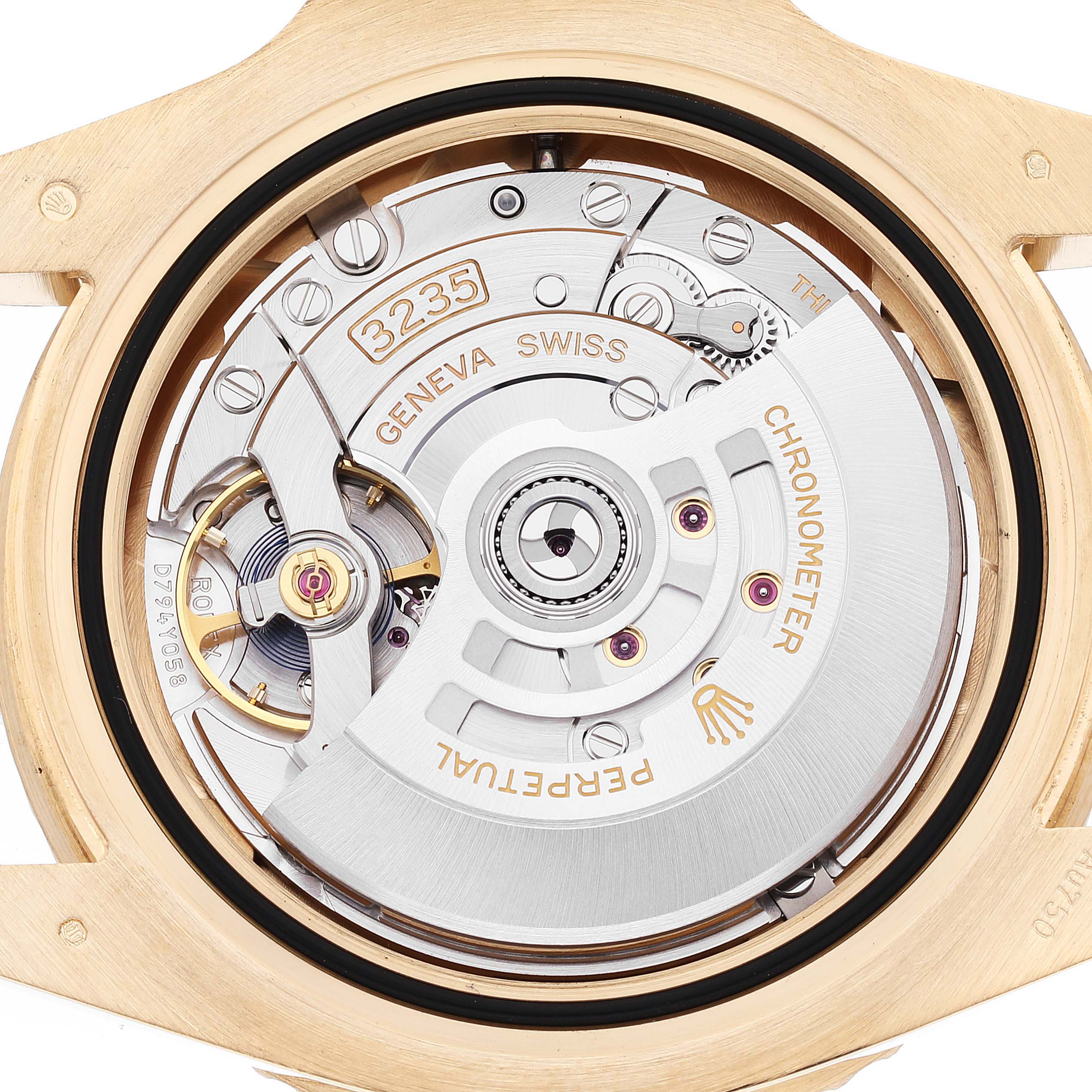 The image shows the intricate movement and internal mechanisms of a Rolex Submariner 126618 Men's Yellow Gold Black Dial 126618 Men's Yellow Gold Black Dial watch from a back view.