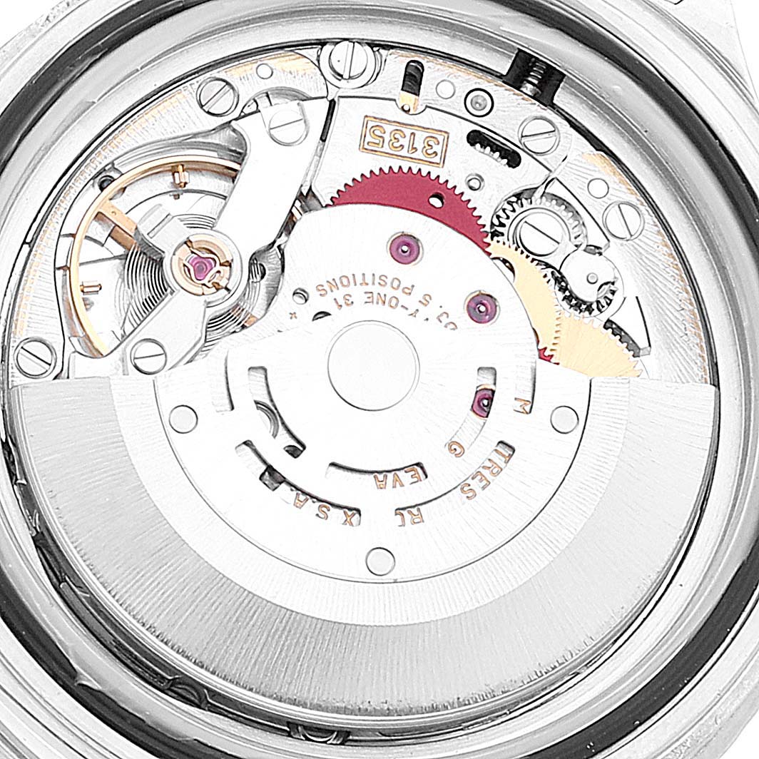 This image shows a close-up view of the internal mechanical movement parts of the Rolex Submariner 16610 Men
s Stainless Steel Black Dial 16610 Men
s Stainless Steel Black Dial watch.