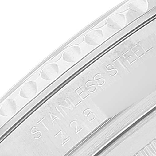 The image displays a close-up of the stainless steel bezel of a Rolex Yacht-Master 16622 Men's Stainless Steel Silver Dial 16622 Men's Stainless Steel Silver Dial watch.