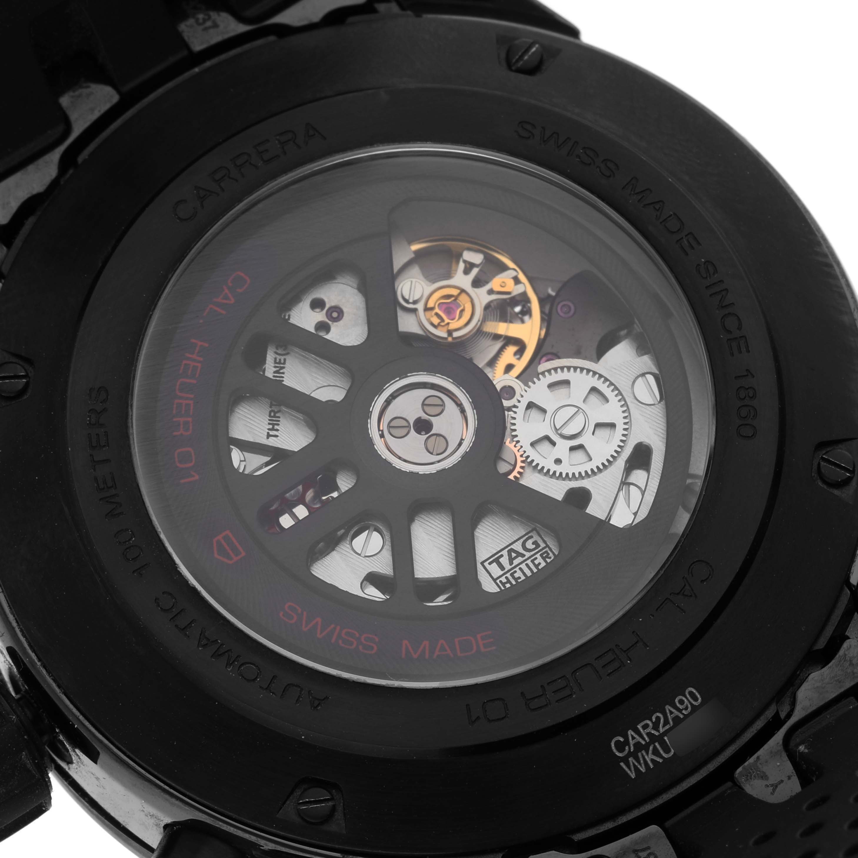 This image shows the back of a Tag Heuer Carrera CAR2A90.FT6071 Men's Ceramic Black Dial CAR2A90.FT6071 Men's Ceramic Black Dial watch, highlighting its movement and internal mechanisms.