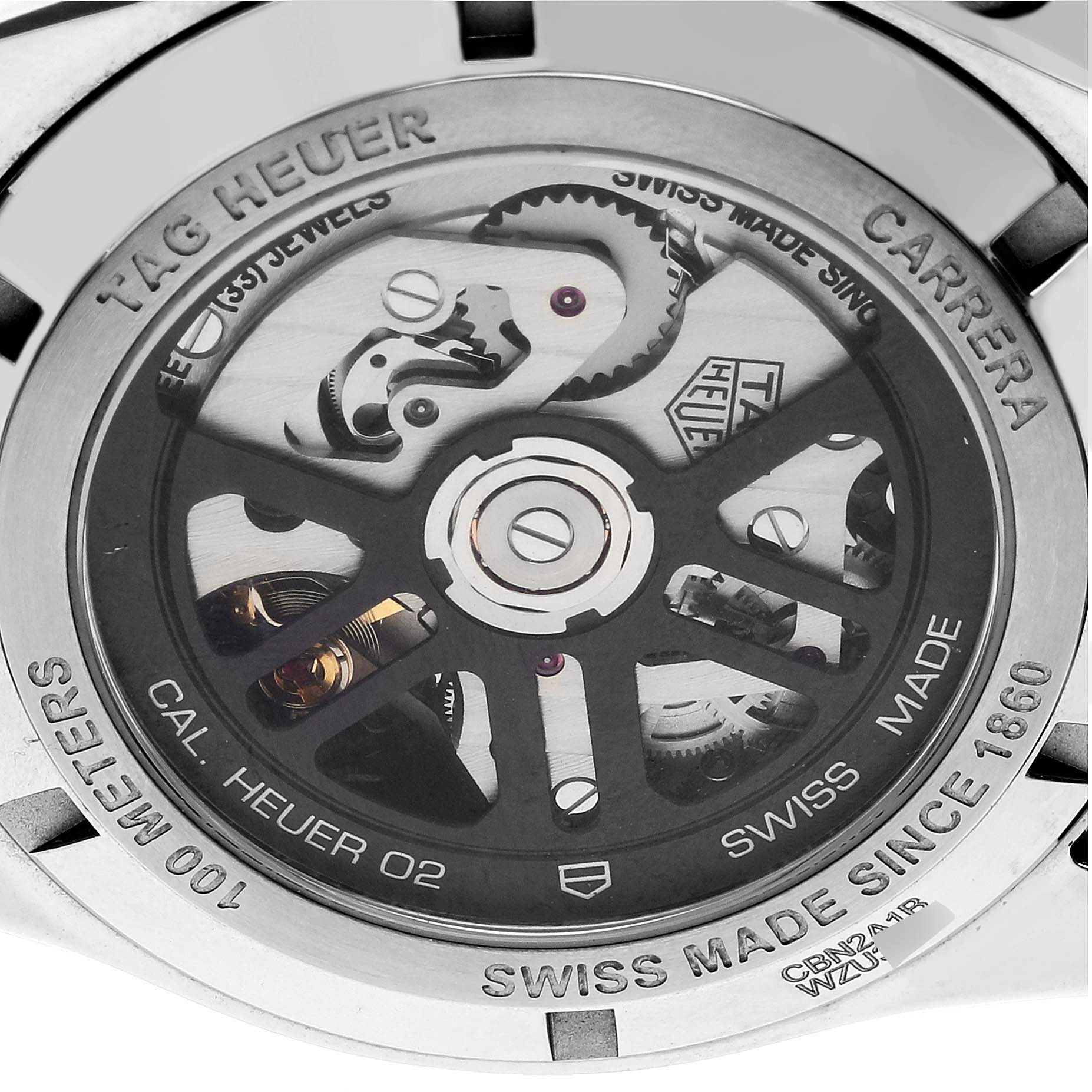 The image shows the back view of the Tag Heuer Carrera CBN2A1B.BA0643 Men's Stainless Steel Black Dial CBN2A1B.BA0643 Men's Stainless Steel Black Dial watch, revealing its intricate mechanism and engravings.