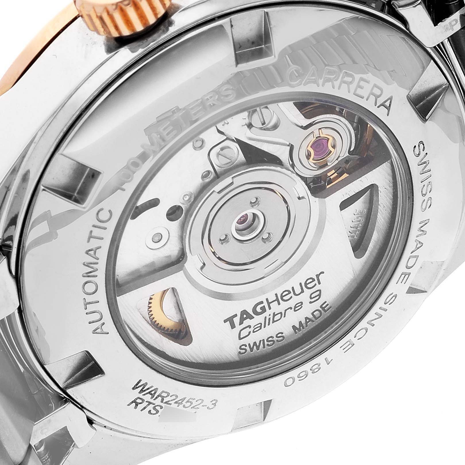 The image shows the back of a Tag Heuer Carrera WAR2452.BD0777 Women's Steel and Gold (two tone) Mother of Pearl Dial WAR2452.BD0777 Women's Steel and Gold (two tone) Mother of Pearl Dial watch, revealing its automatic movement and internal mechanism.