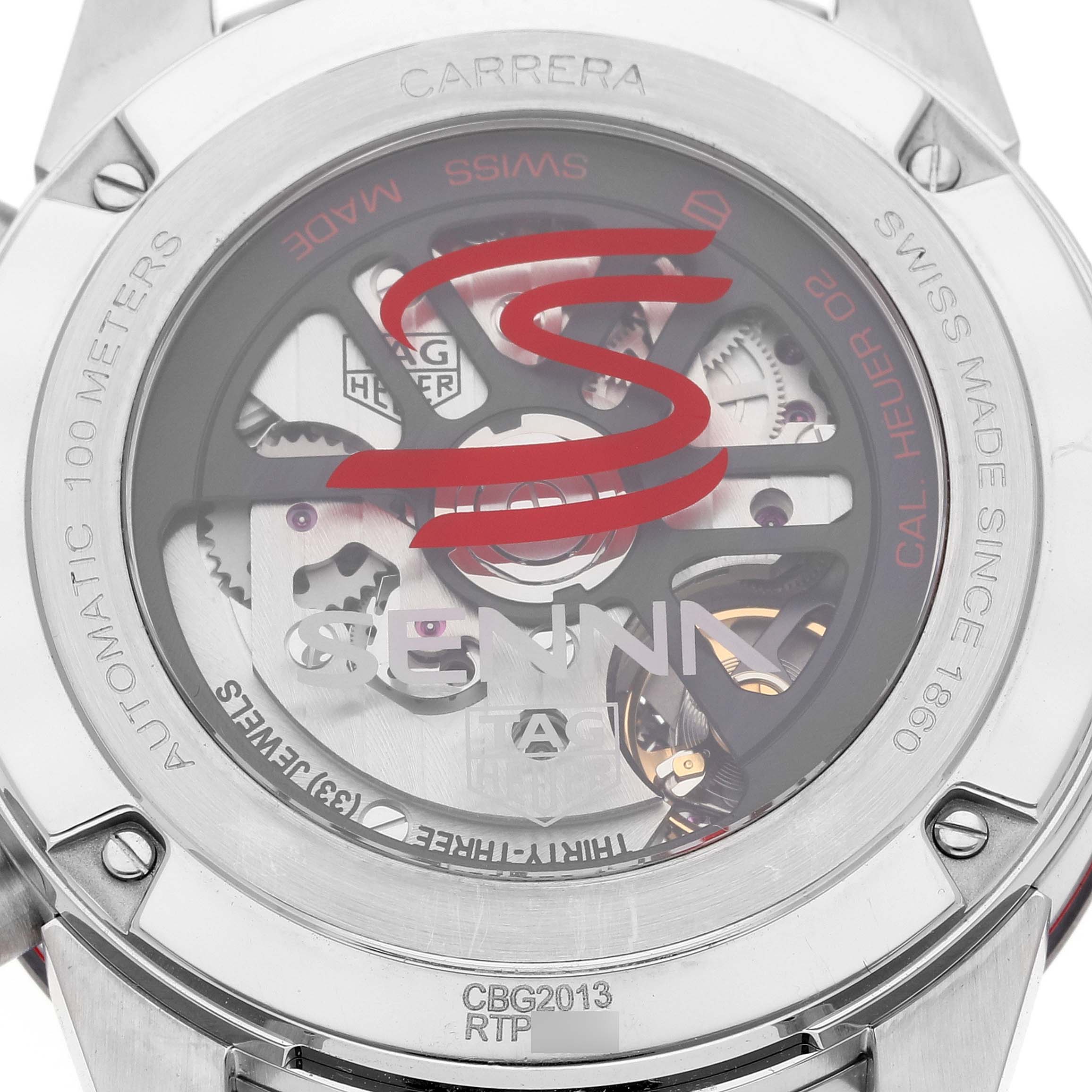 The image shows the back case of a Tag Heuer Carrera CBG2013 Men's Stainless Steel Transparent Dial CBG2013 Men's Stainless Steel Transparent Dial watch, showcasing its intricate mechanical movement.