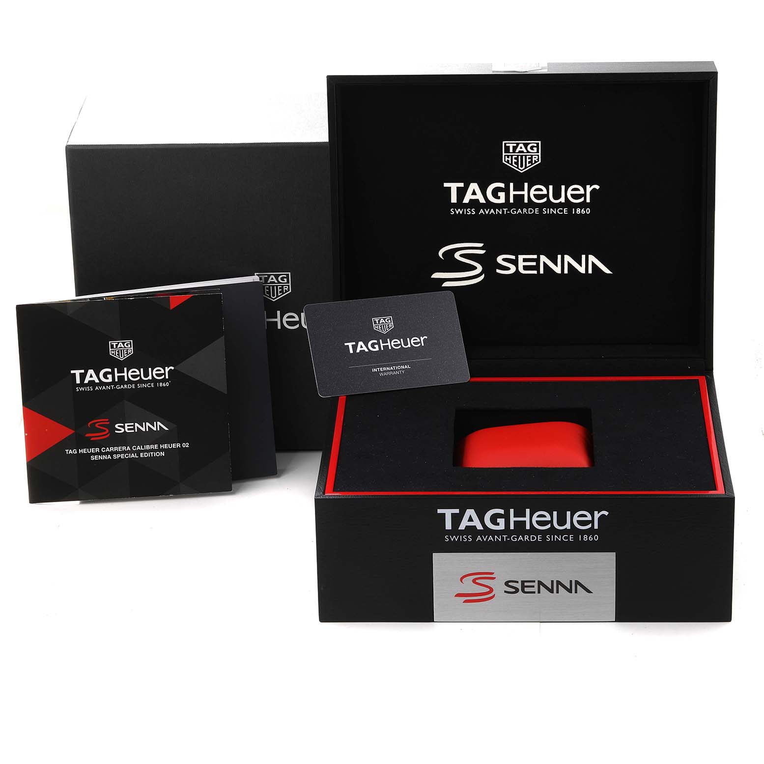 The image shows the packaging, manuals, and card for a Tag Heuer Carrera CBG2013 Men's Stainless Steel Transparent Dial CBG2013 Men's Stainless Steel Transparent Dial model, with focus on the box and accessories from an elevated angle.