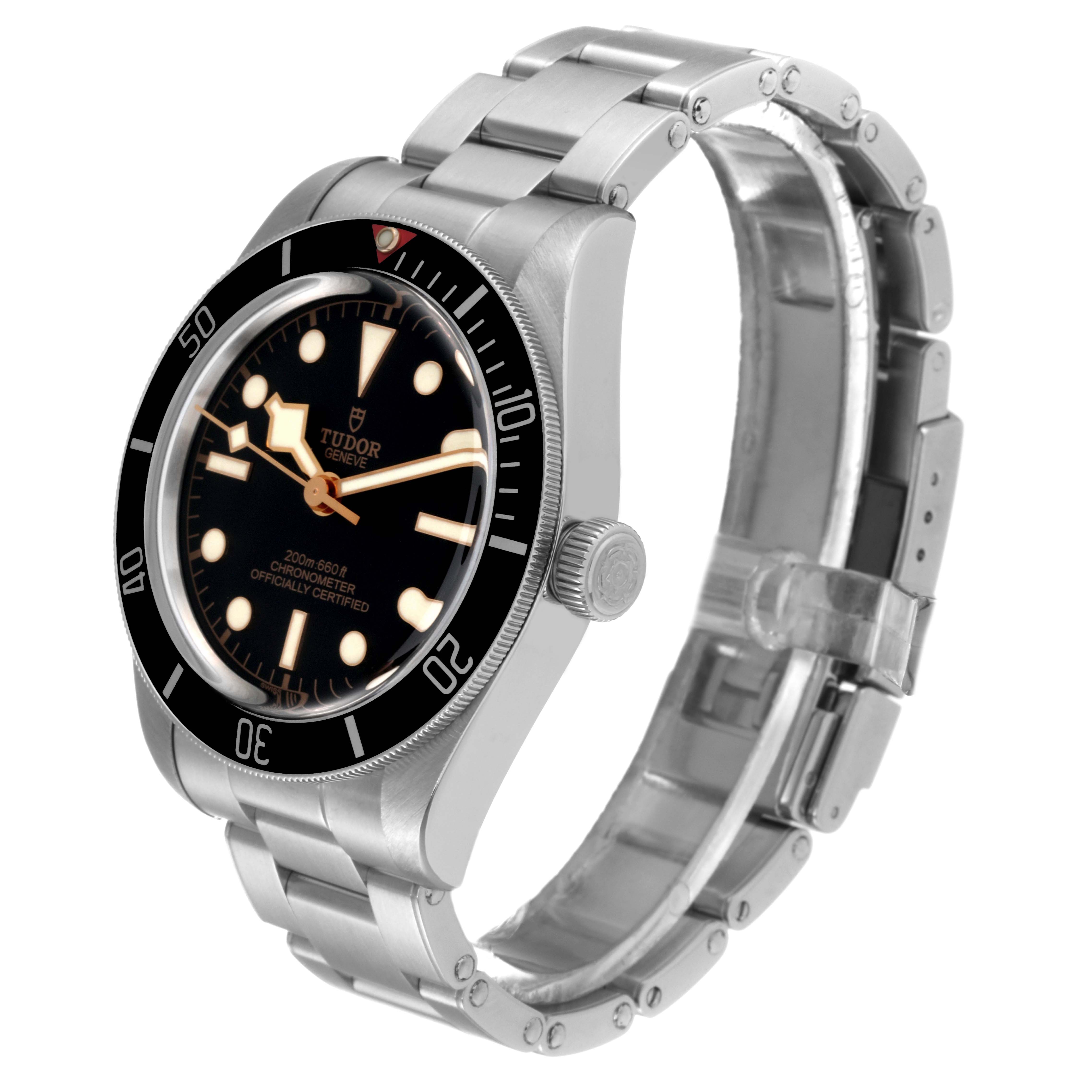 The image shows a Tudor Heritage Black Bay M79030N-0001 Men
s Stainless Steel Black Dial M79030N-0001 Men
s Stainless Steel Black Dial watch at a three-quarter angle, highlighting the dial, bezel, and stainless steel bracelet.
