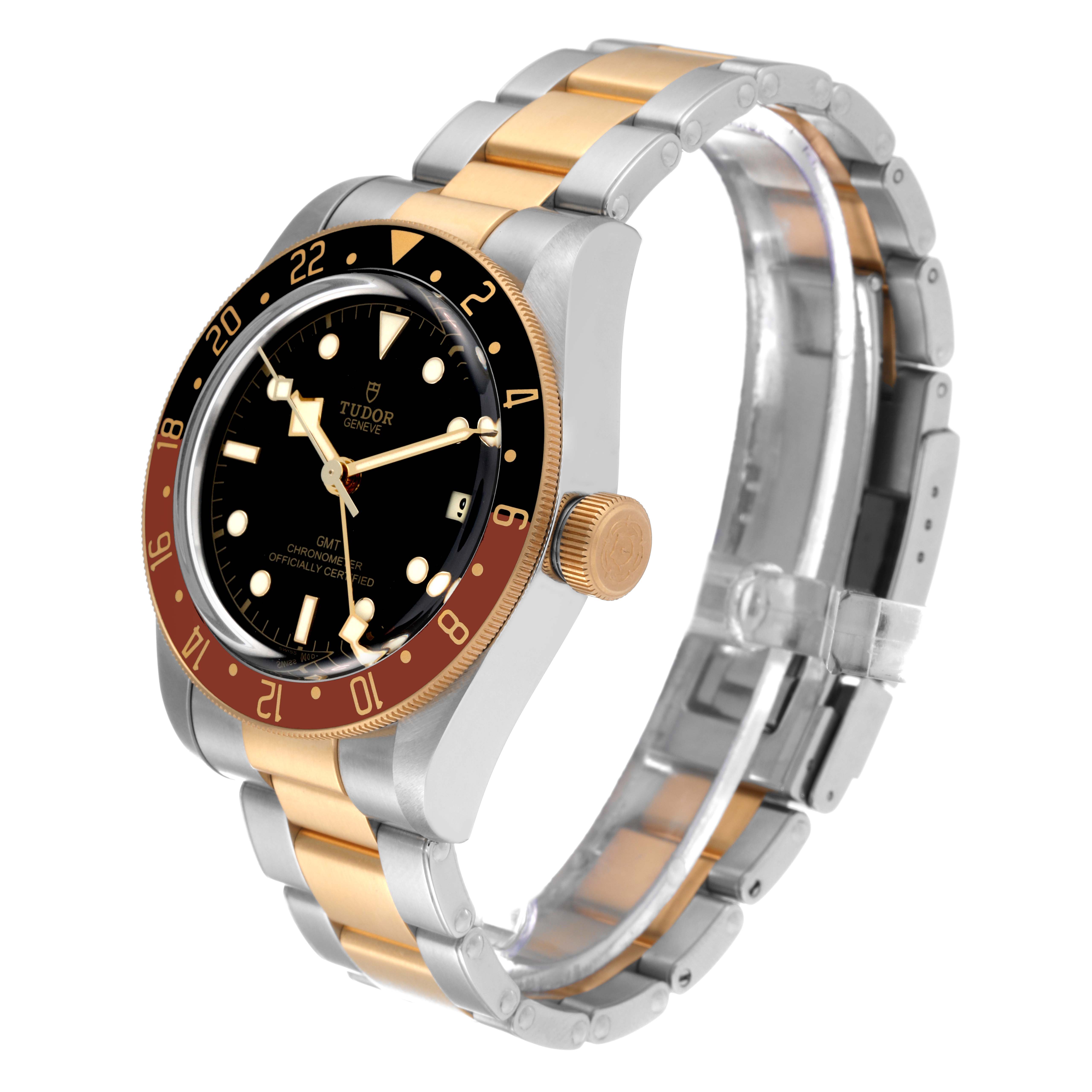 The image shows a Tudor Heritage Black Bay 79833MN Men's Steel and Gold (two tone) Black Dial 79833MN Men's Steel and Gold (two tone) Black Dial model watch at a slight angle, displaying its black dial, bronze accents, and two-tone bracelet.
