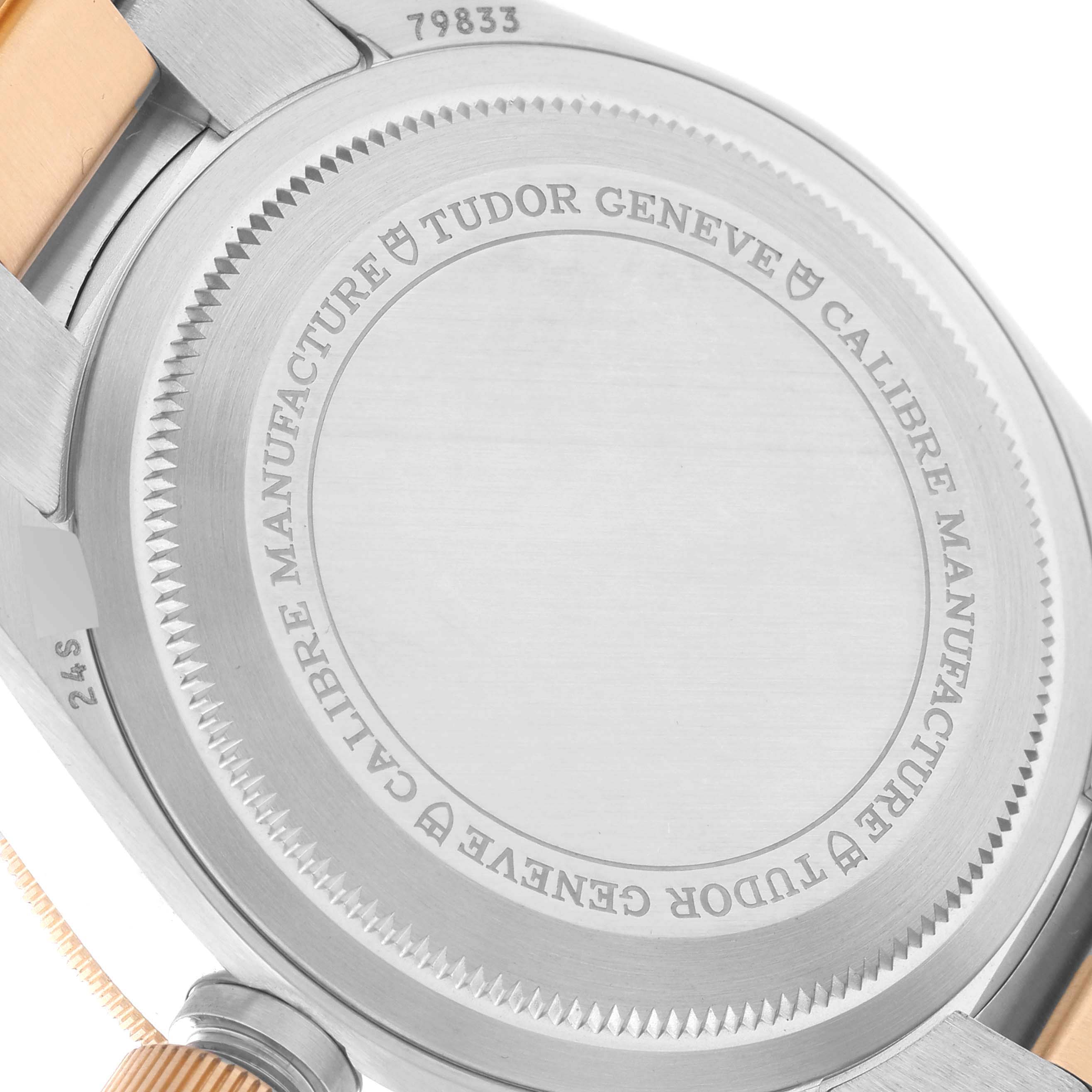 The image shows the back case of the Tudor Heritage Black Bay 79833MN Men's Steel and Gold (two tone) Black Dial 79833MN Men's Steel and Gold (two tone) Black Dial watch.