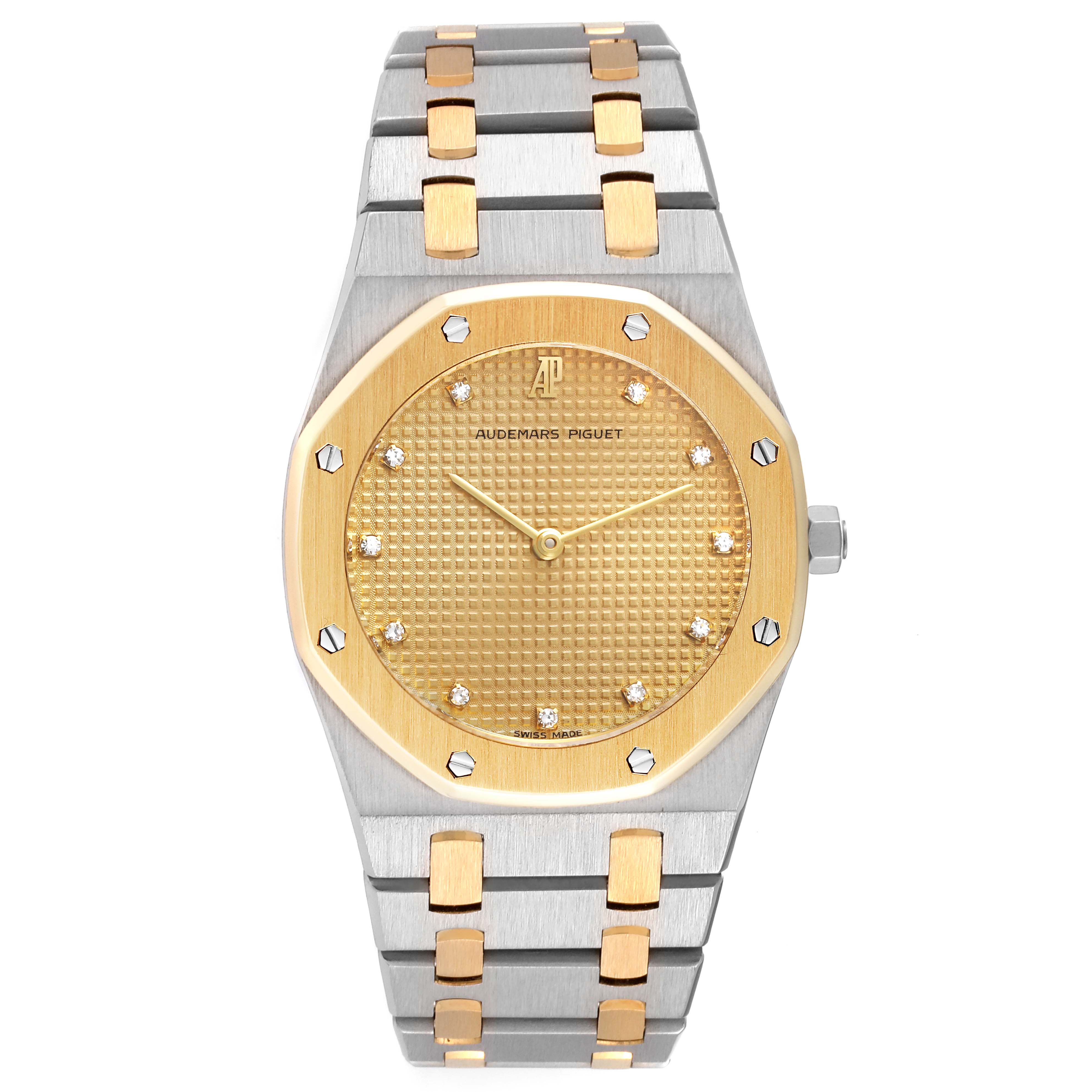 The image shows a front view of an Audemars Piguet Royal Oak 56303SA Women's Steel and Gold (two tone) Champagne Dial 56303SA Women's Steel and Gold (two tone) Champagne Dial watch with a gold-toned face and a two-tone bracelet.