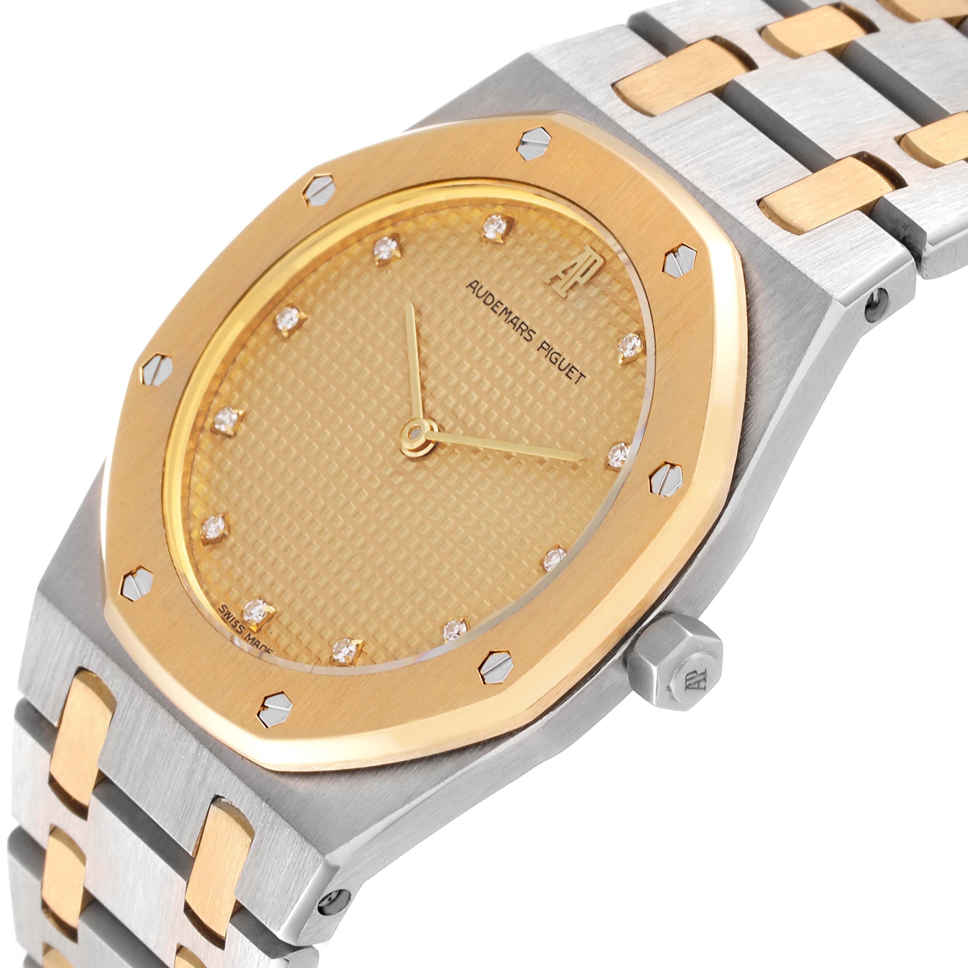 The image shows the face and bracelet of the Audemars Piguet Royal Oak 56303SA Women's Steel and Gold (two tone) Champagne Dial 56303SA Women's Steel and Gold (two tone) Champagne Dial watch from an oblique angle.