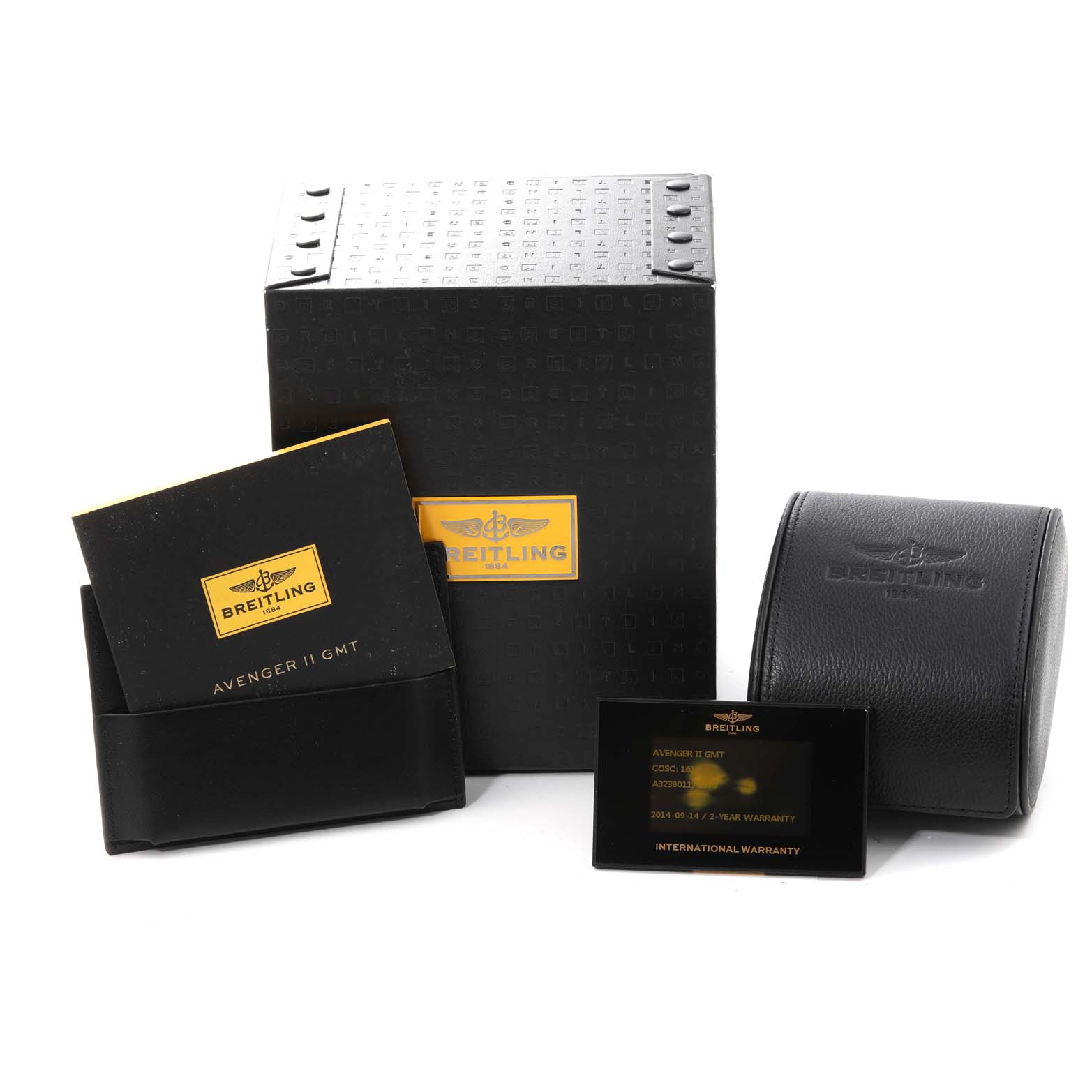 The image shows the packaging, instruction booklet, warranty card, and carrying case for a Breitling Avenger A32390 Men's Stainless Steel Beige Dial A32390 Men's Stainless Steel Beige Dial watch.