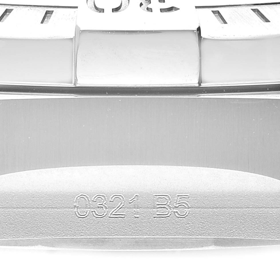 The image shows a close-up of the bezel and part of the watch band for the Breitling Avenger A17318 Men's Stainless Steel Blue Dial A17318 Men's Stainless Steel Blue Dial model.