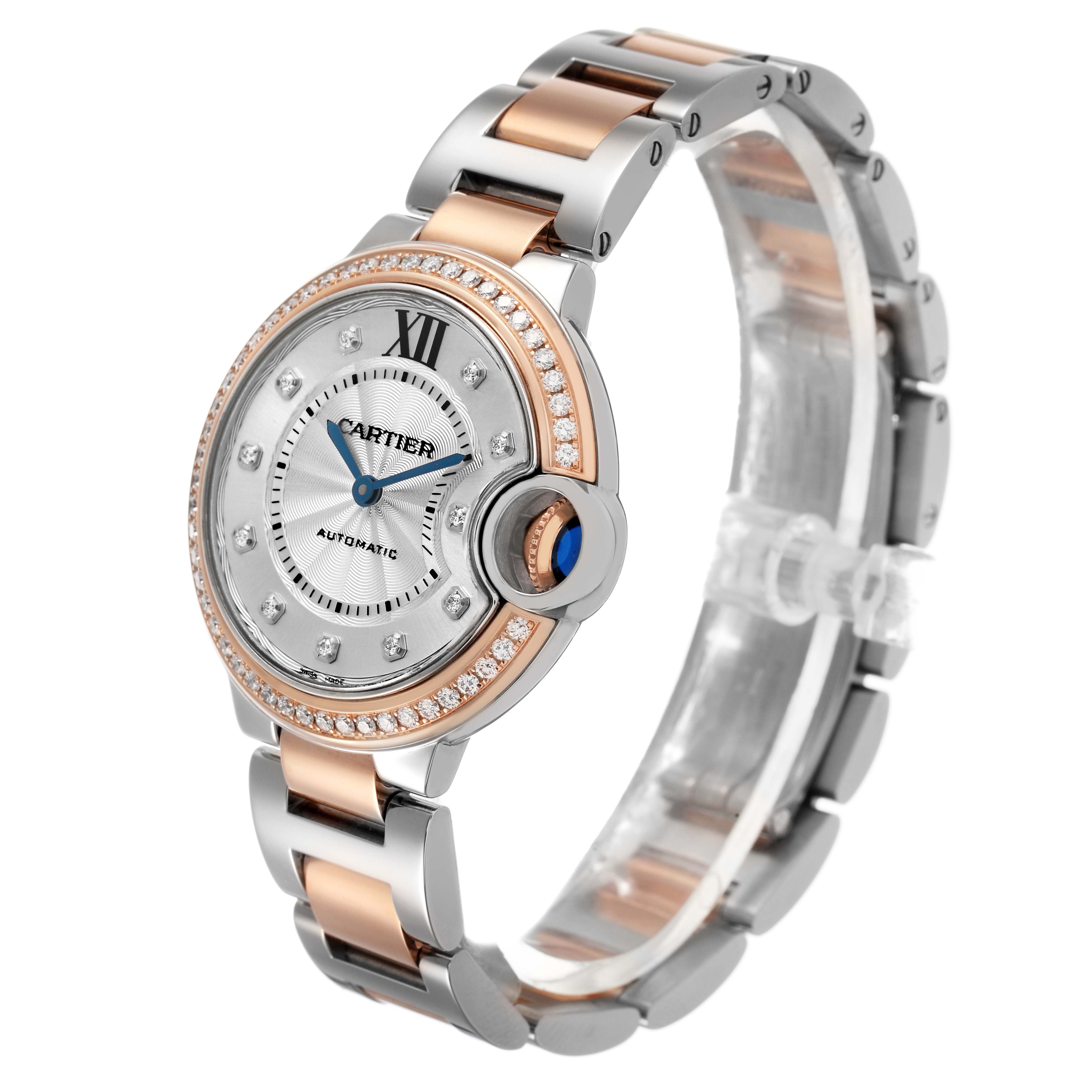 The Cartier Ballon Bleu W3BB0023 Women's Steel and Gold (two tone) White Dial watch is shown at a three-quarter angle, highlighting its round face, crown, and two-tone bracelet.