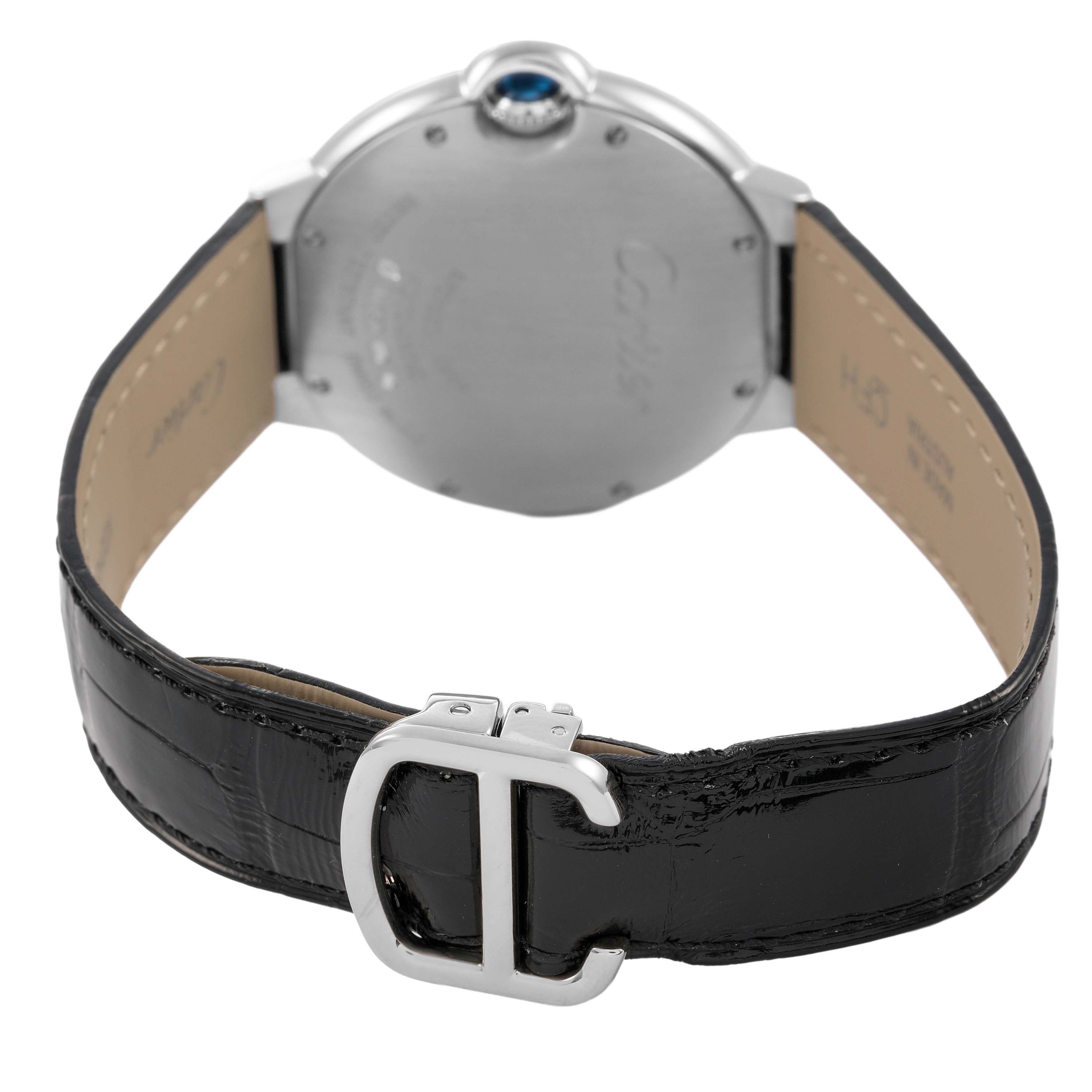 The Ballon Bleu by Cartier is shown from the back, highlighting the clasp and leather strap.