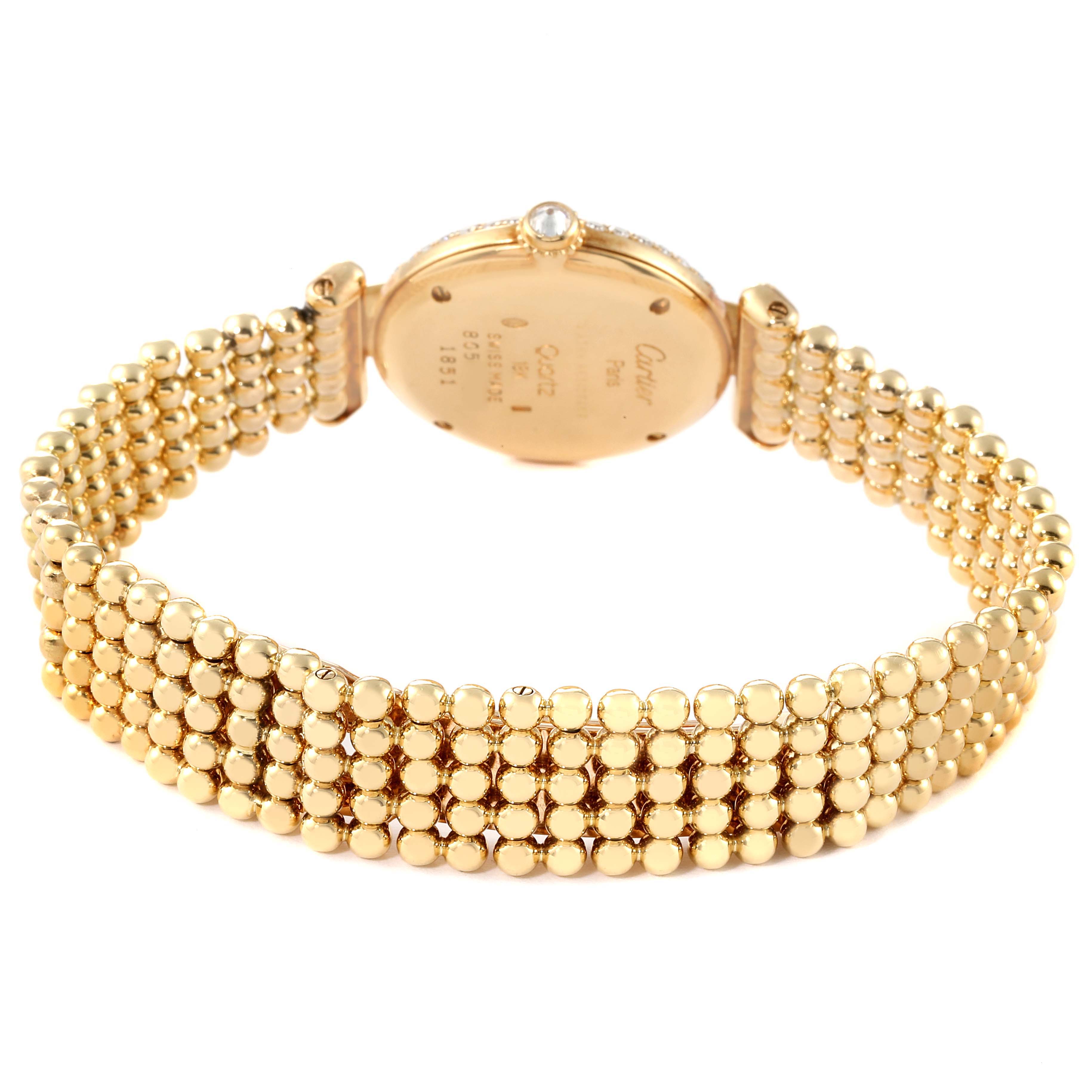 The image shows the back of a Cartier Colisee WB1018A8 Women's Yellow Gold Silver Dial WB1018A8 Women's Yellow Gold Silver Dial model watch, highlighting the gold bracelet and case back.