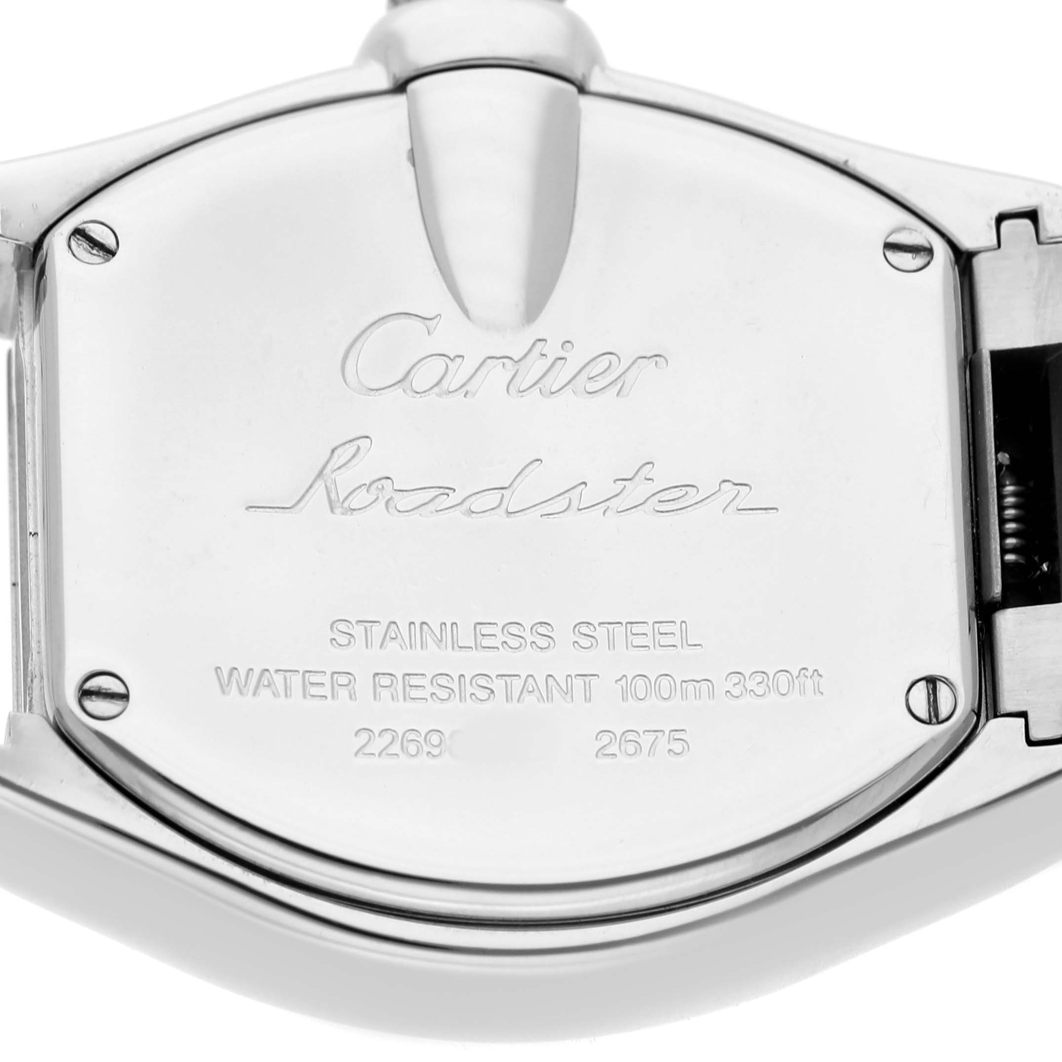 The image shows the back case of a Cartier Roadster W62016V3 Women's Stainless Steel Silver Dial watch, detailing stainless steel and water resistance information.
