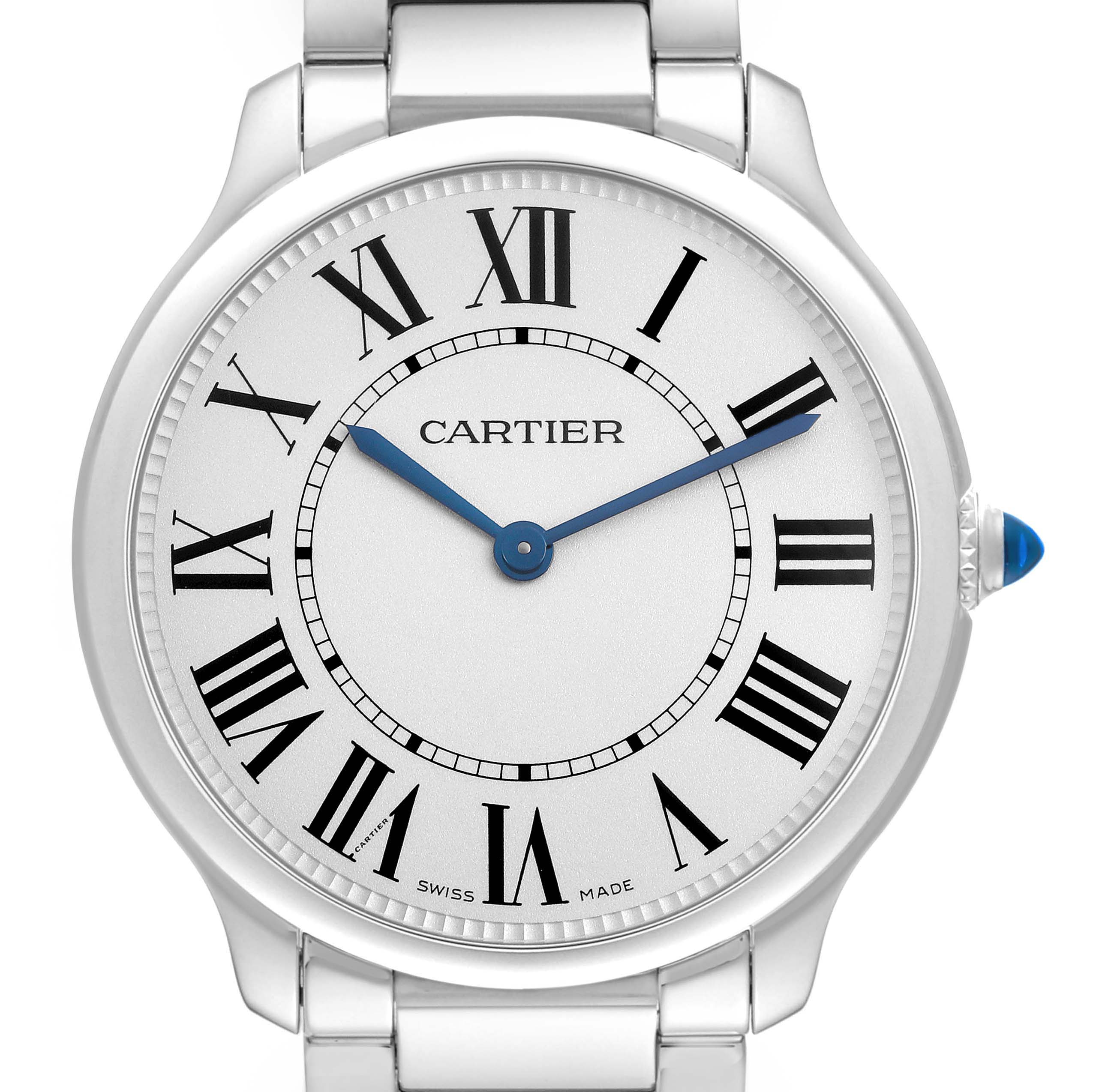 The Ronde model by Cartier is shown from the front, featuring its face, Roman numerals, blue hands, and part of the bracelet.