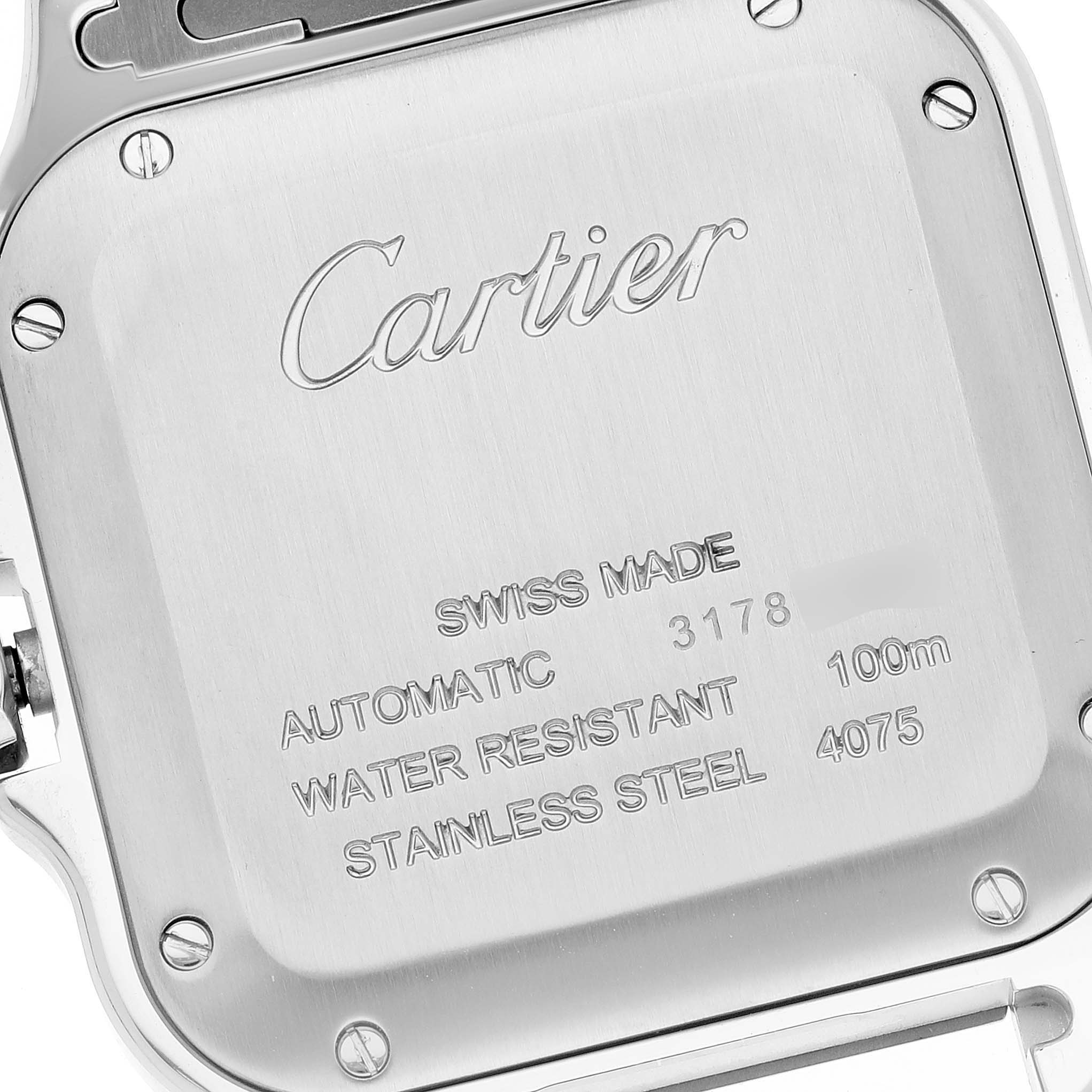 The image shows the back case of a Cartier Santos W4SA0006 Men's Stainless Steel Blue Dial W4SA0006 Men's Stainless Steel Blue Dial watch, displaying details like "Swiss Made," "Automatic," and "Water Resistant 100m."